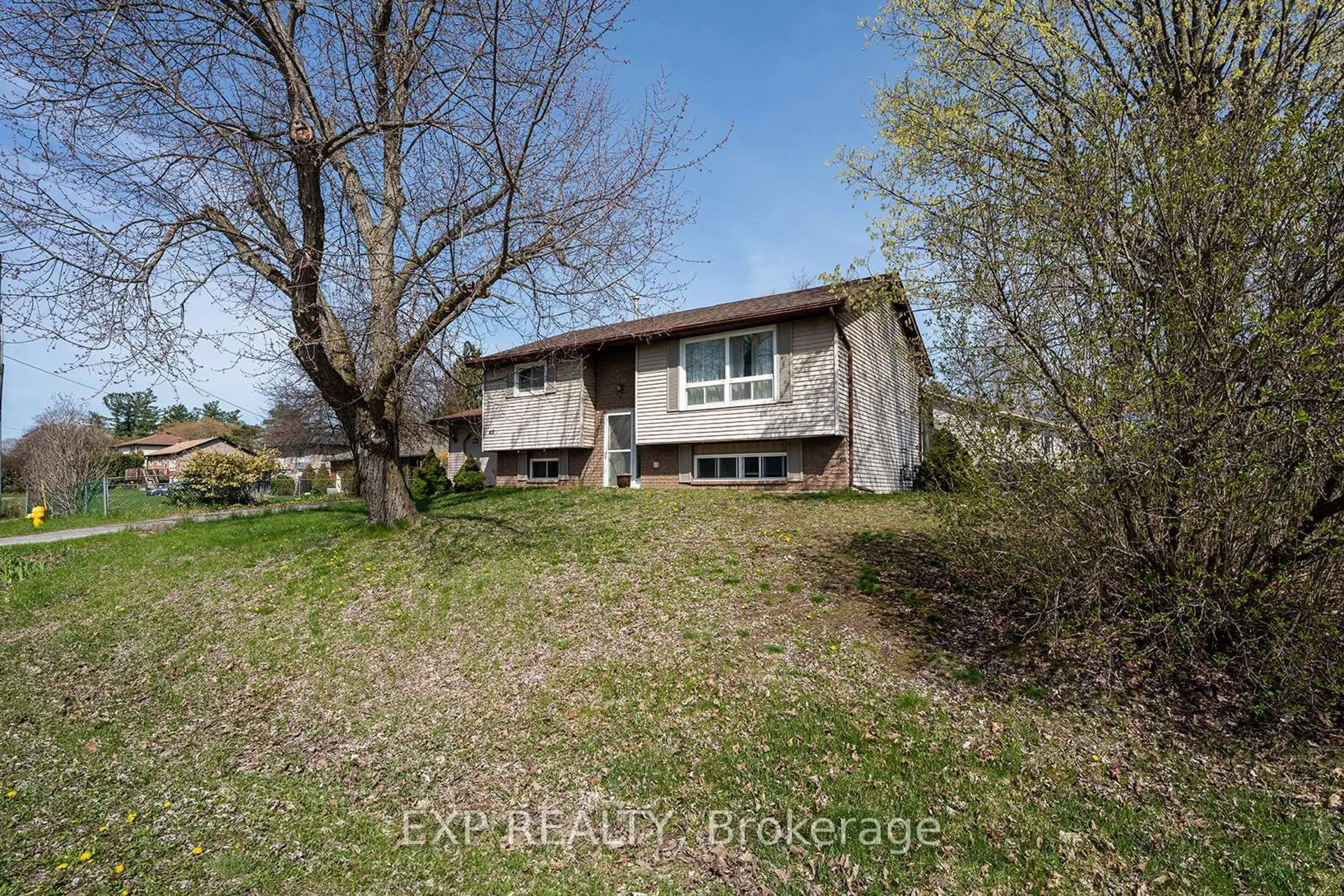 A pic from outside/outdoor area/front of a property/back of a property/a pic from drone, street for 45 Roth St, Essa Ontario L0M 1B0