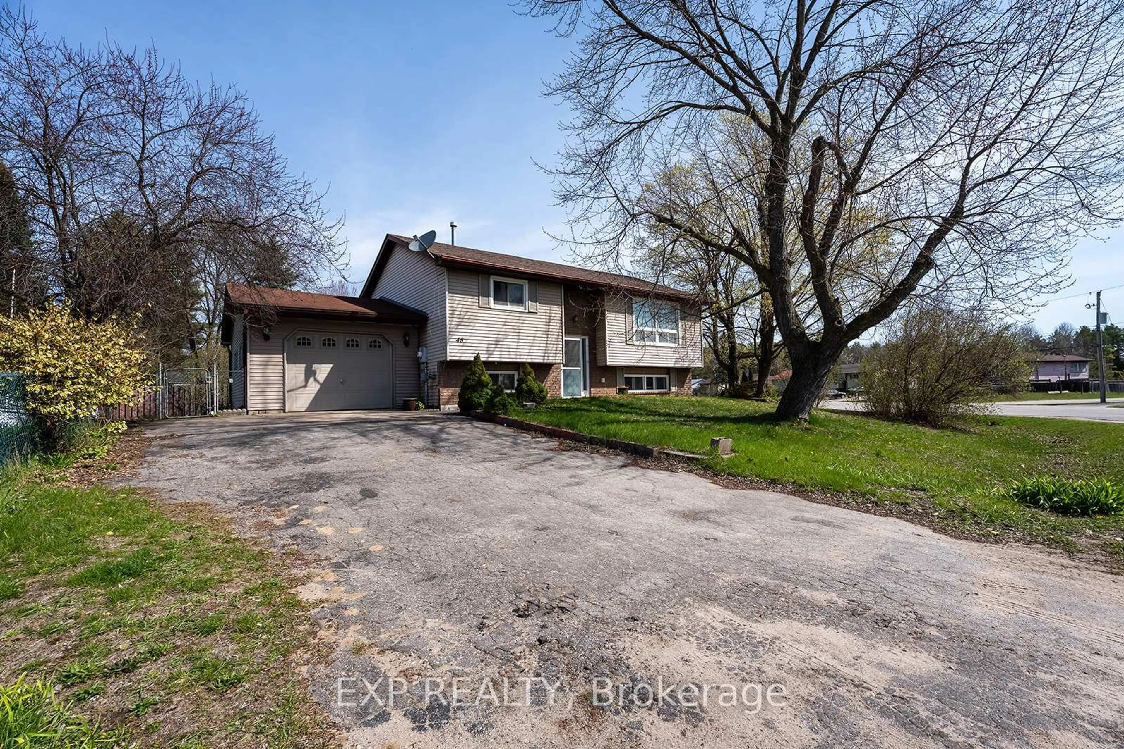 A pic from outside/outdoor area/front of a property/back of a property/a pic from drone, street for 45 Roth St, Essa Ontario L0M 1B0