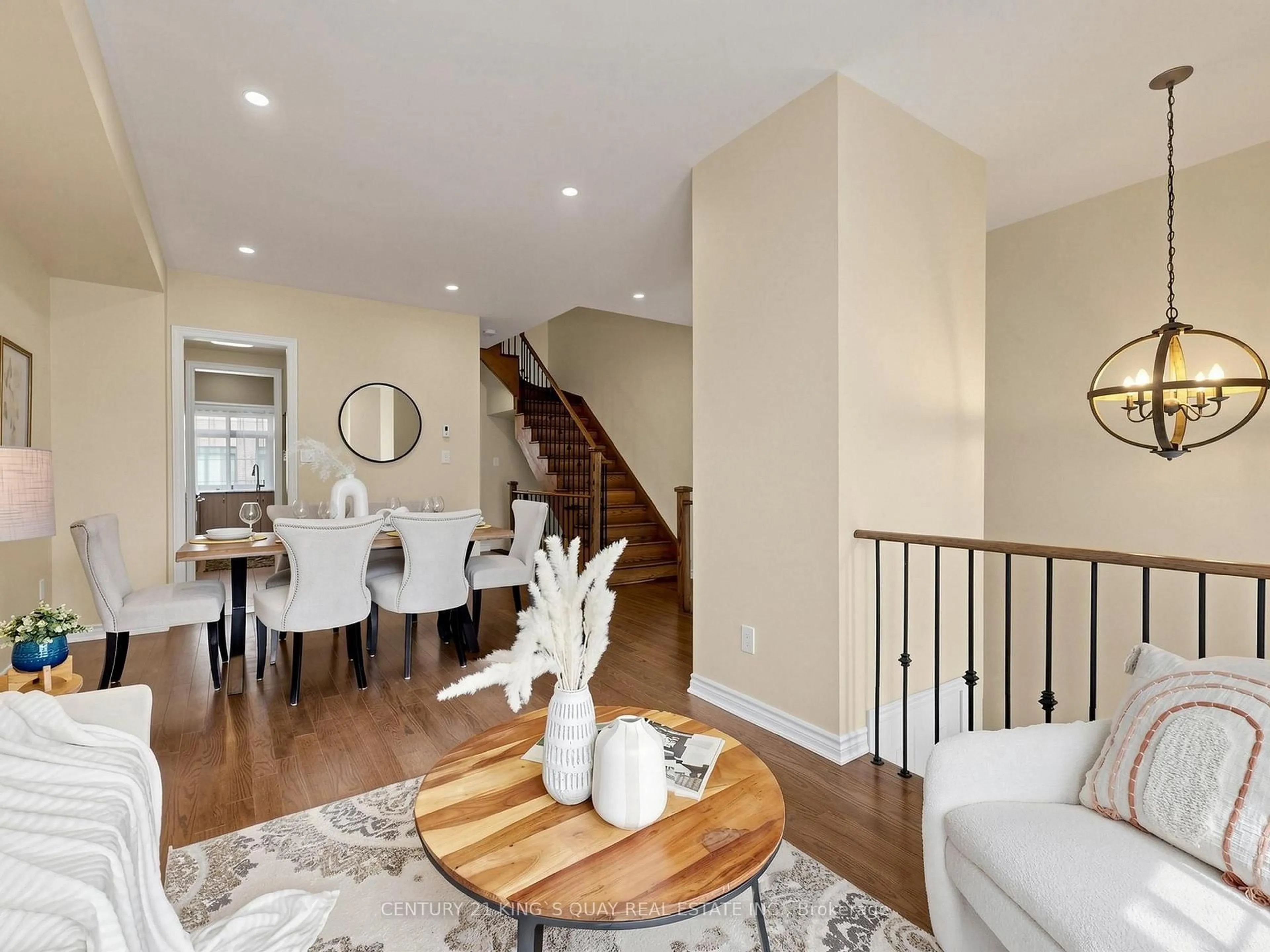 Living room with furniture, wood/laminate floor for 106 Sandwell St, Vaughan Ontario L4H 4R2