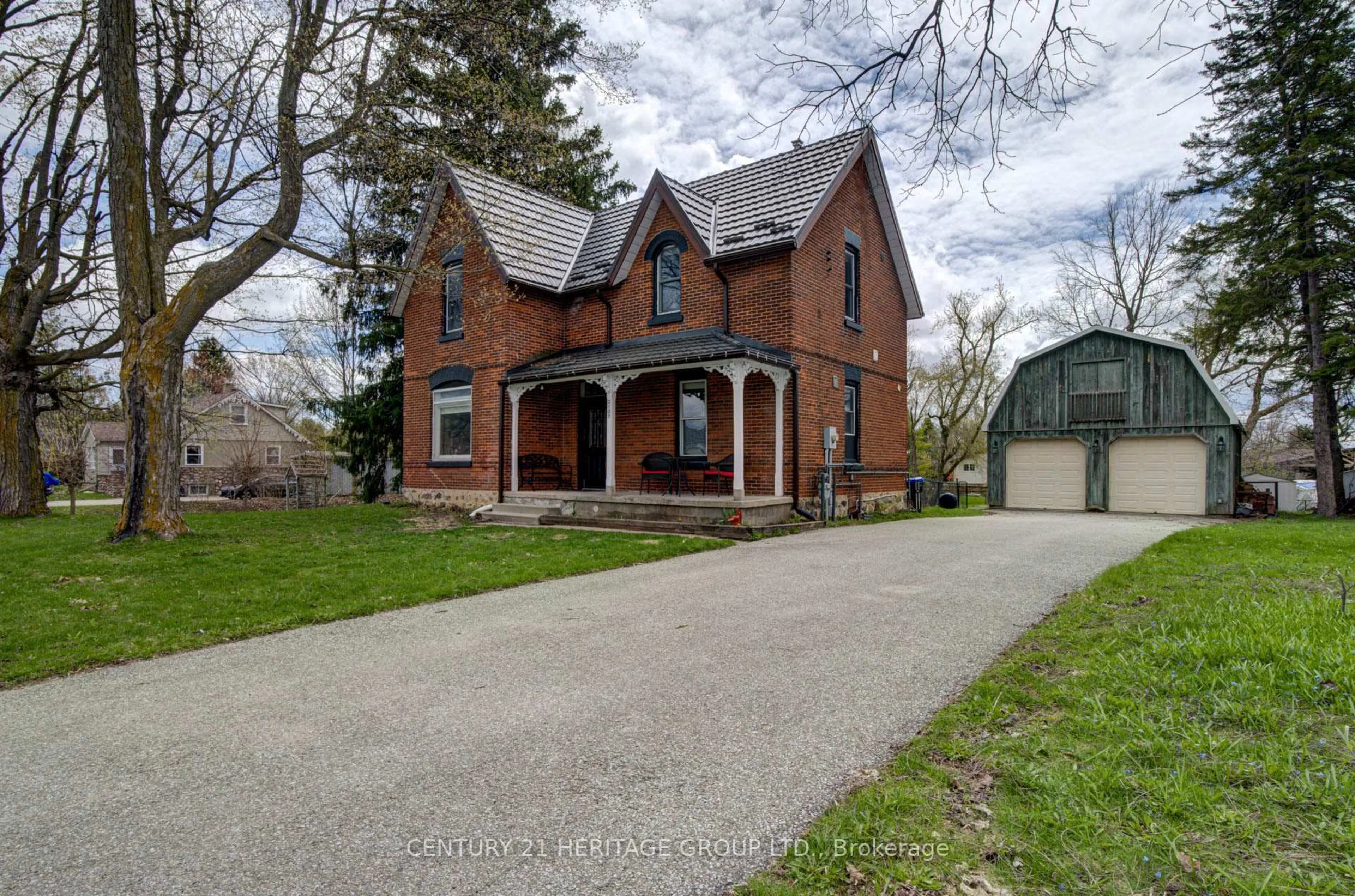 Home with brick exterior material, street for 2107 Victoria St, Innisfil Ontario L9S 1J7