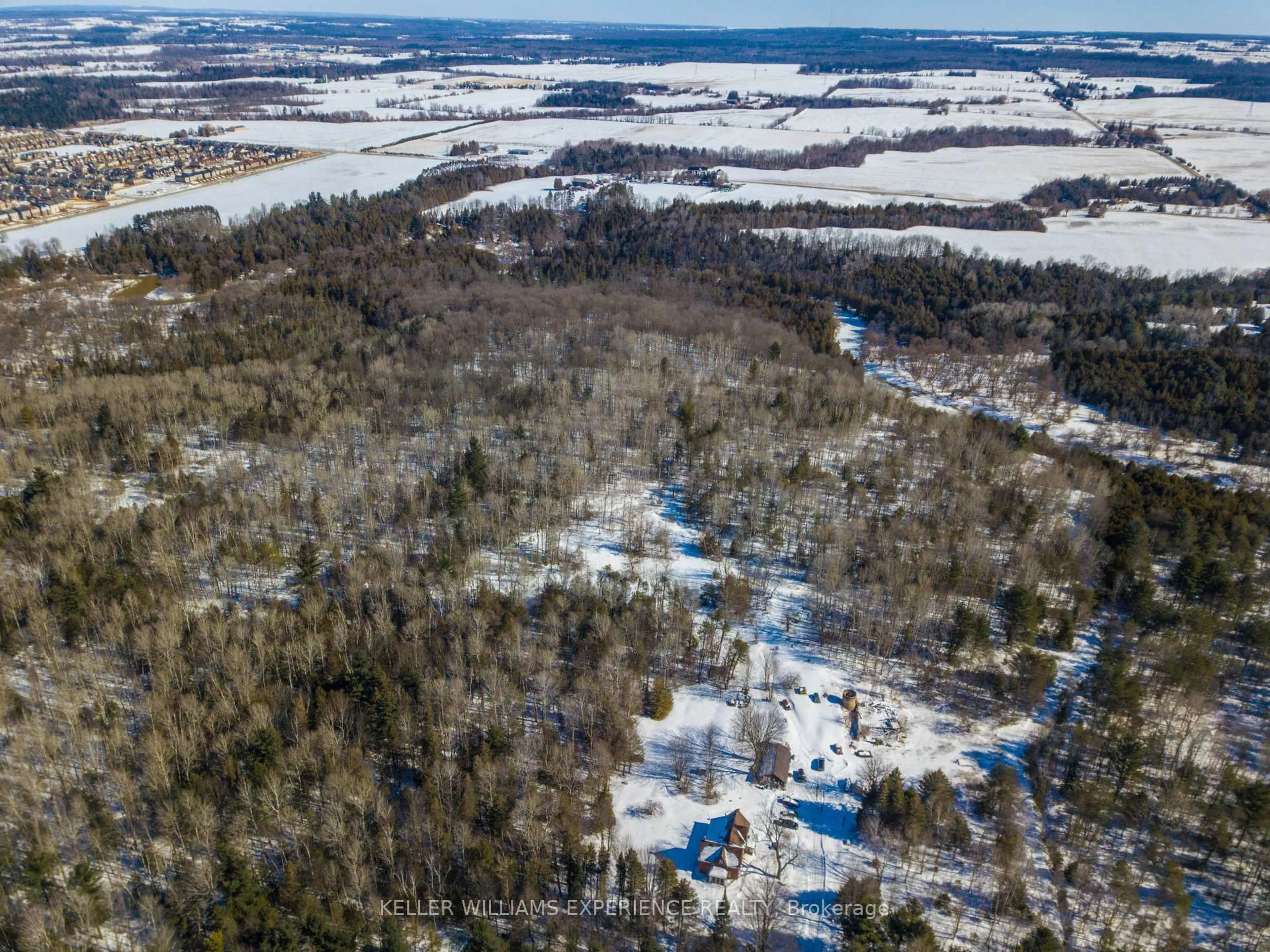 A pic from outside/outdoor area/front of a property/back of a property/a pic from drone, forest/trees view for 8137 4th Line, Essa Ontario L3W 0S5