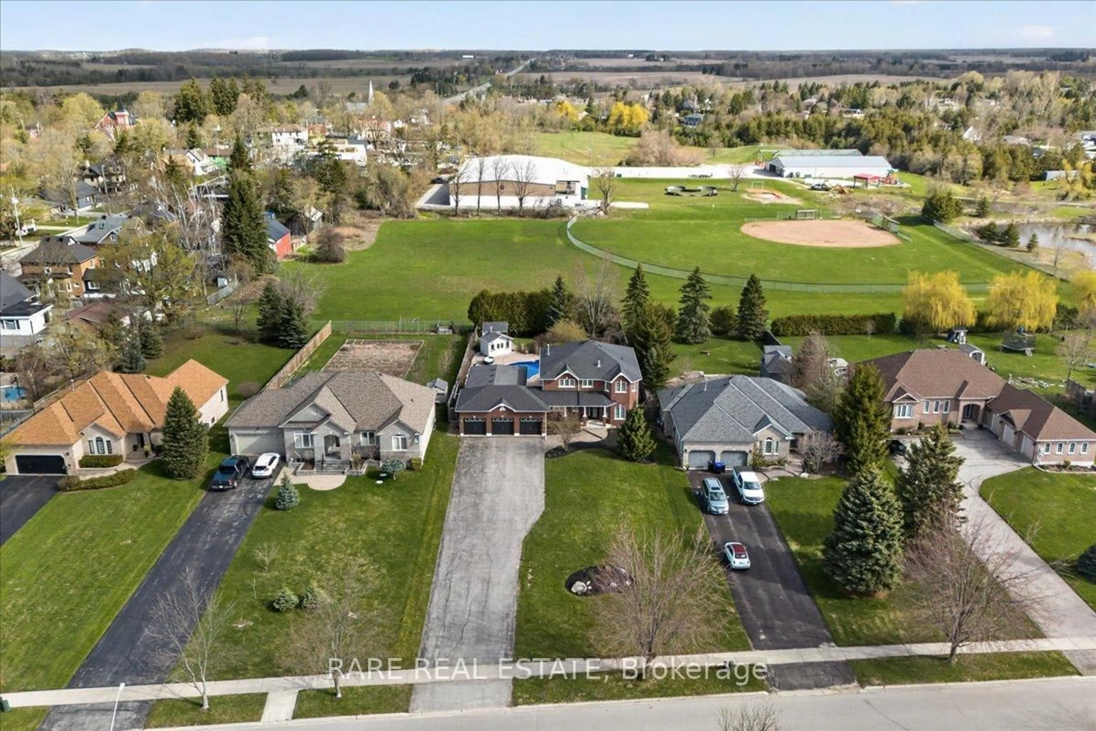 A pic from outside/outdoor area/front of a property/back of a property/a pic from drone, street for 6 Brykman Rd, Essa Ontario L0L 2N2