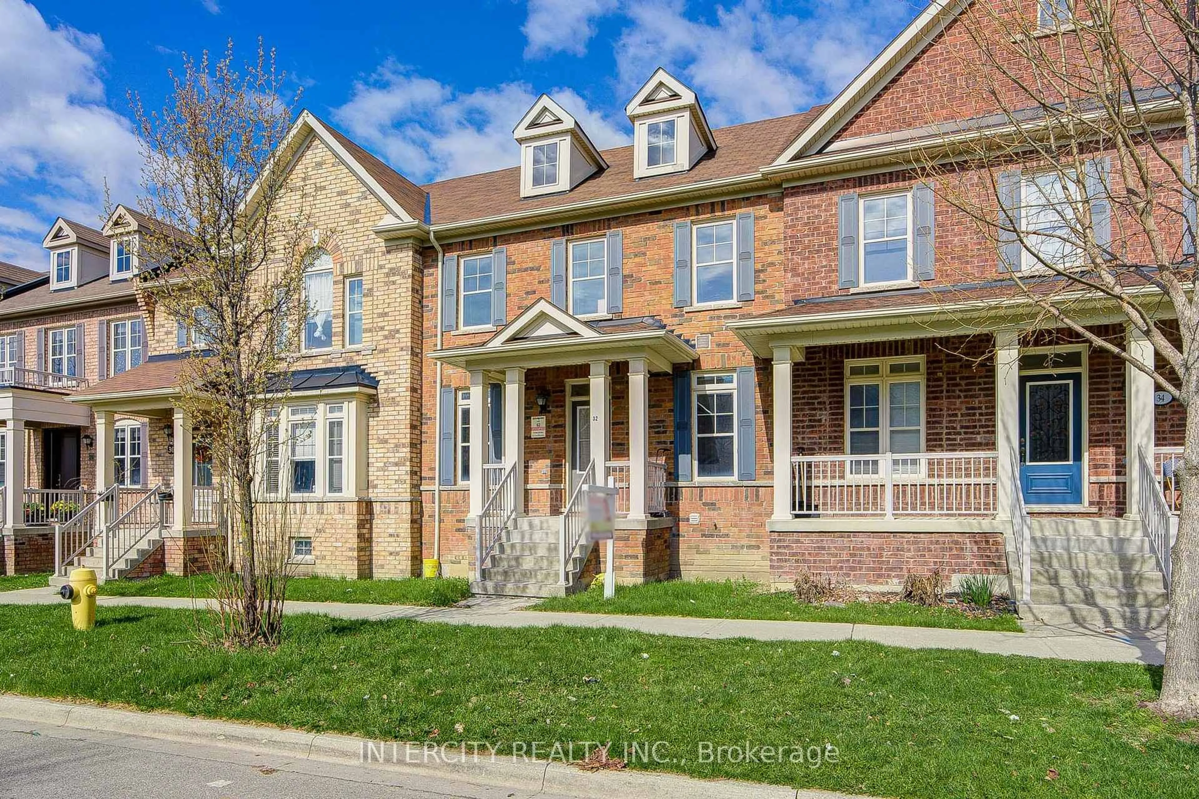 Home with brick exterior material, street for 32 Ivory Silk Dr, Markham Ontario L6C 0G8