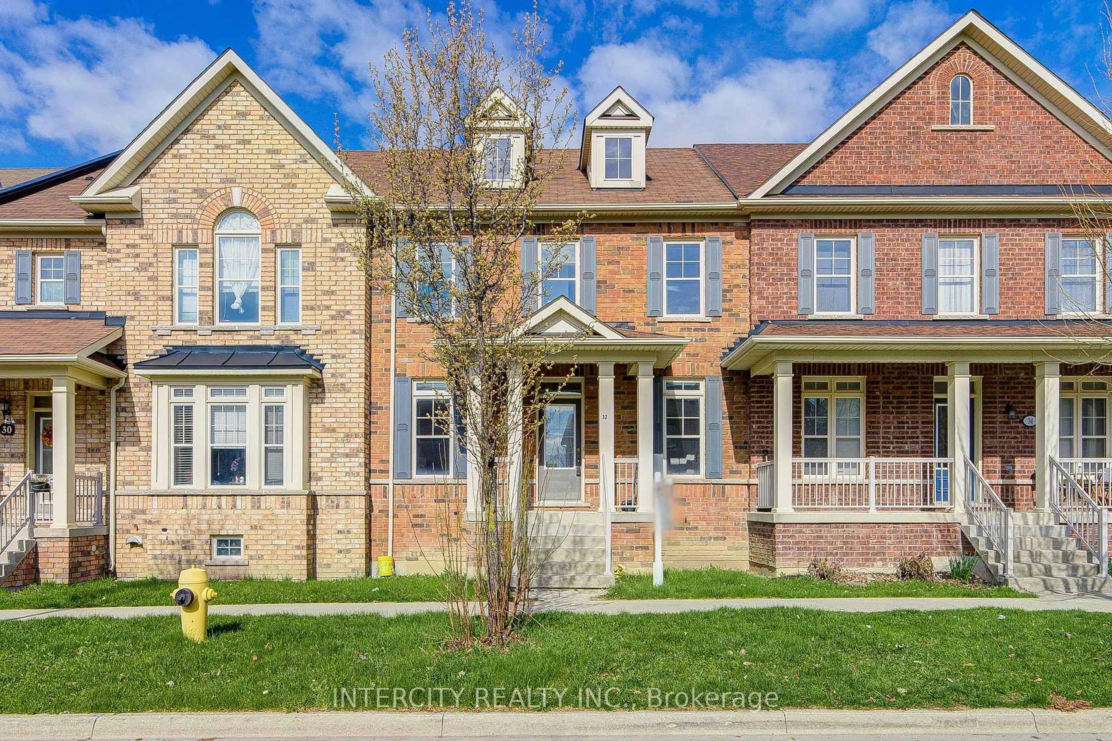 Home with brick exterior material, street for 32 Ivory Silk Dr, Markham Ontario L6C 0G8