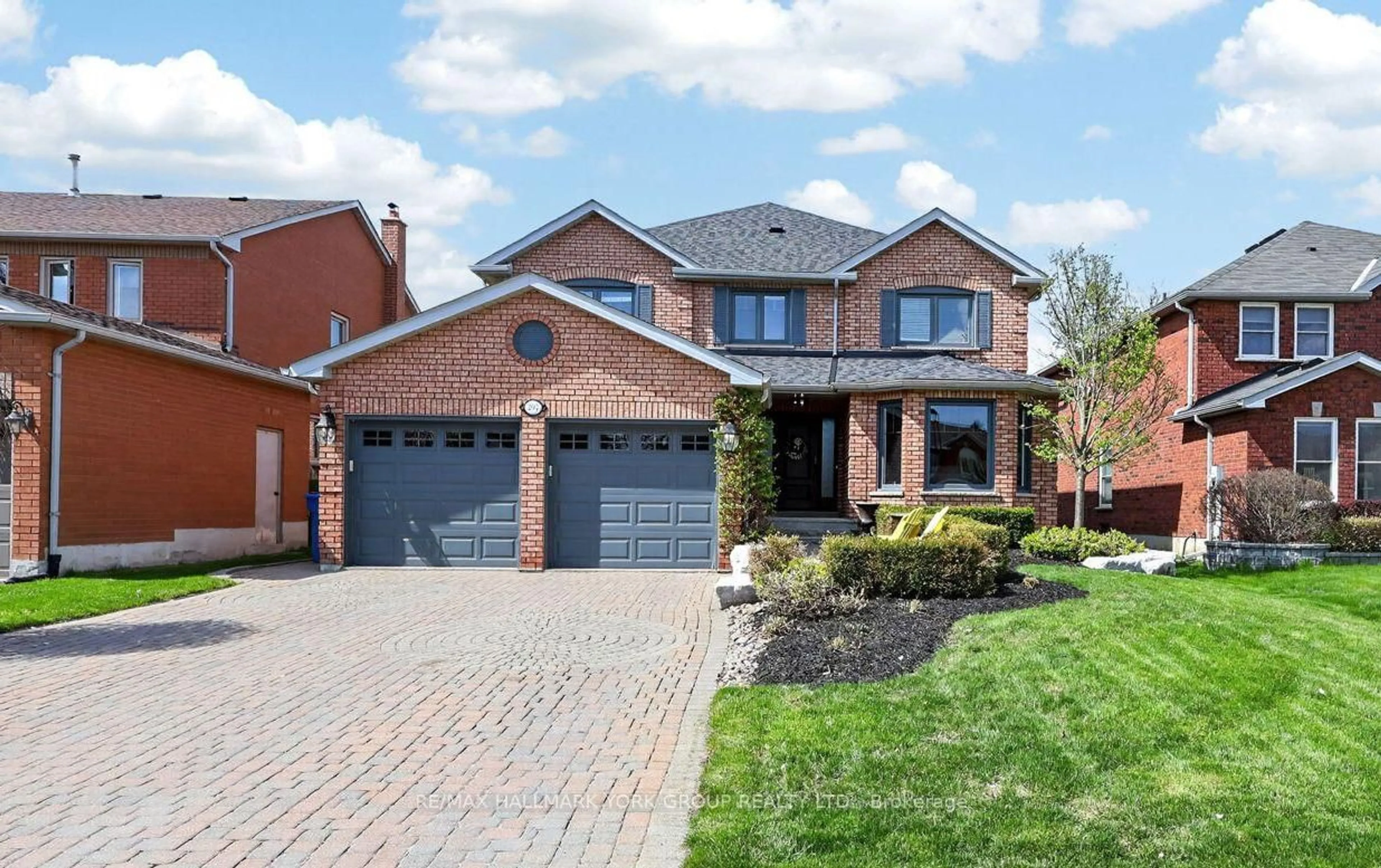 Home with brick exterior material, street for 297 Alex Doner Dr, Newmarket Ontario L3X 1G5