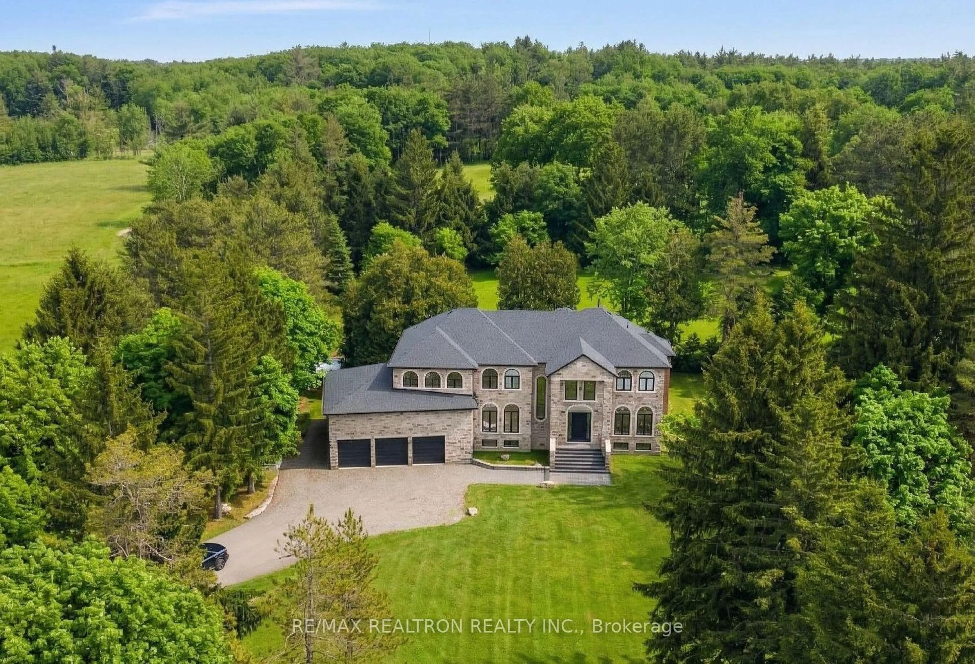 A pic from outside/outdoor area/front of a property/back of a property/a pic from drone, unknown for 14705 Jane St, King Ontario L7B 1A3
