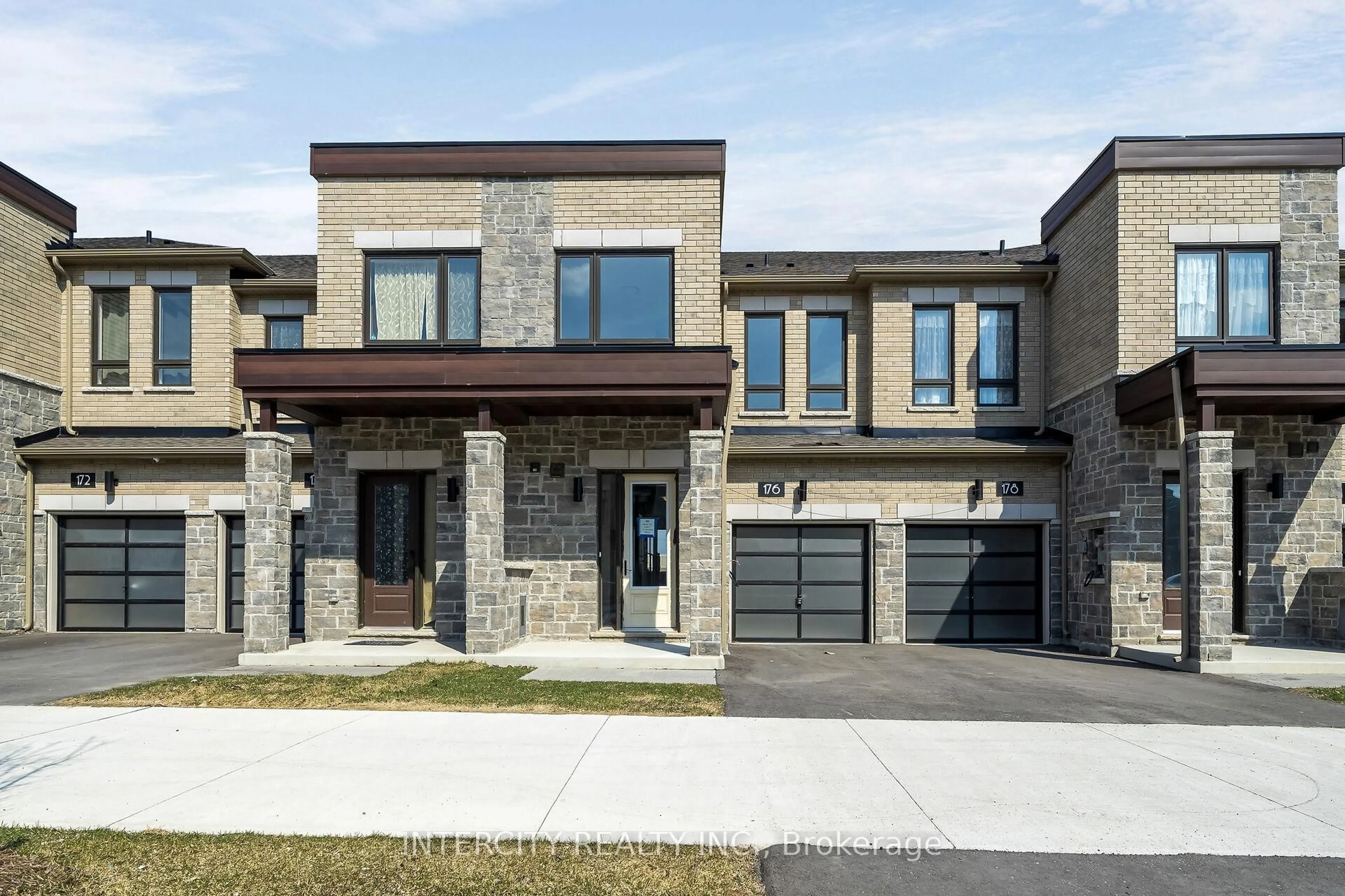 Home with brick exterior material, street for 176 Mumbai Dr, Markham Ontario L3S 0G5