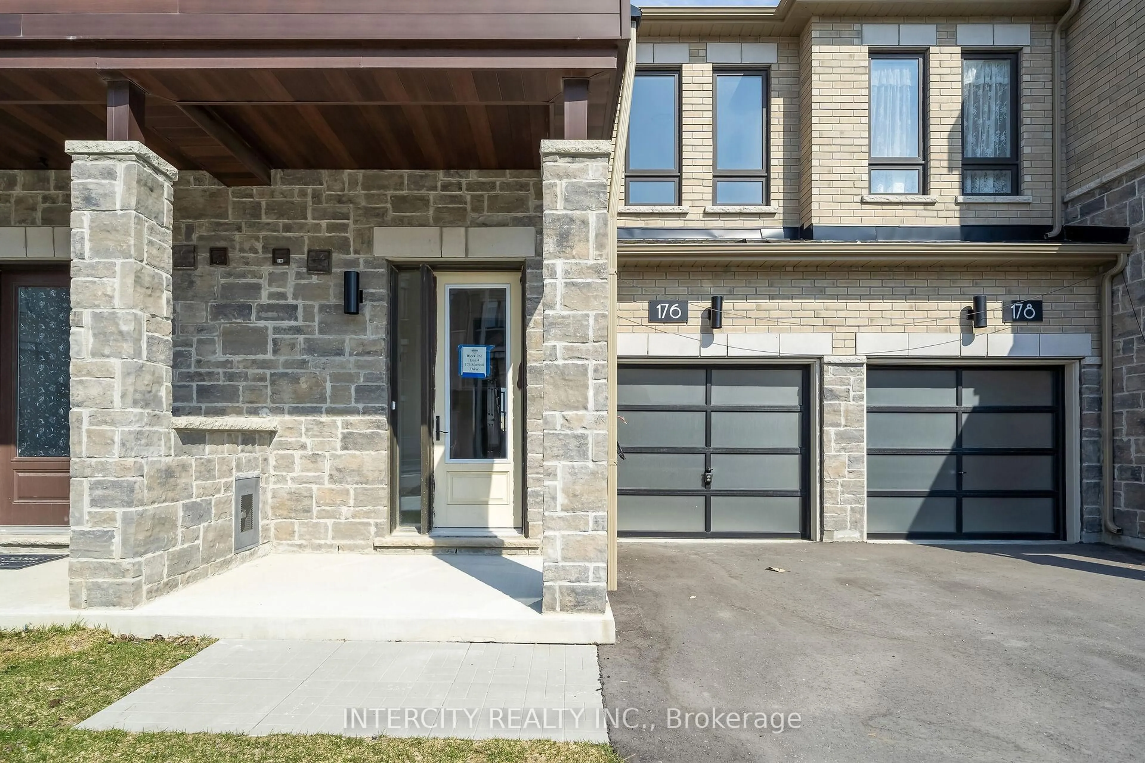 Home with brick exterior material, street for 176 Mumbai Dr, Markham Ontario L3S 0G5