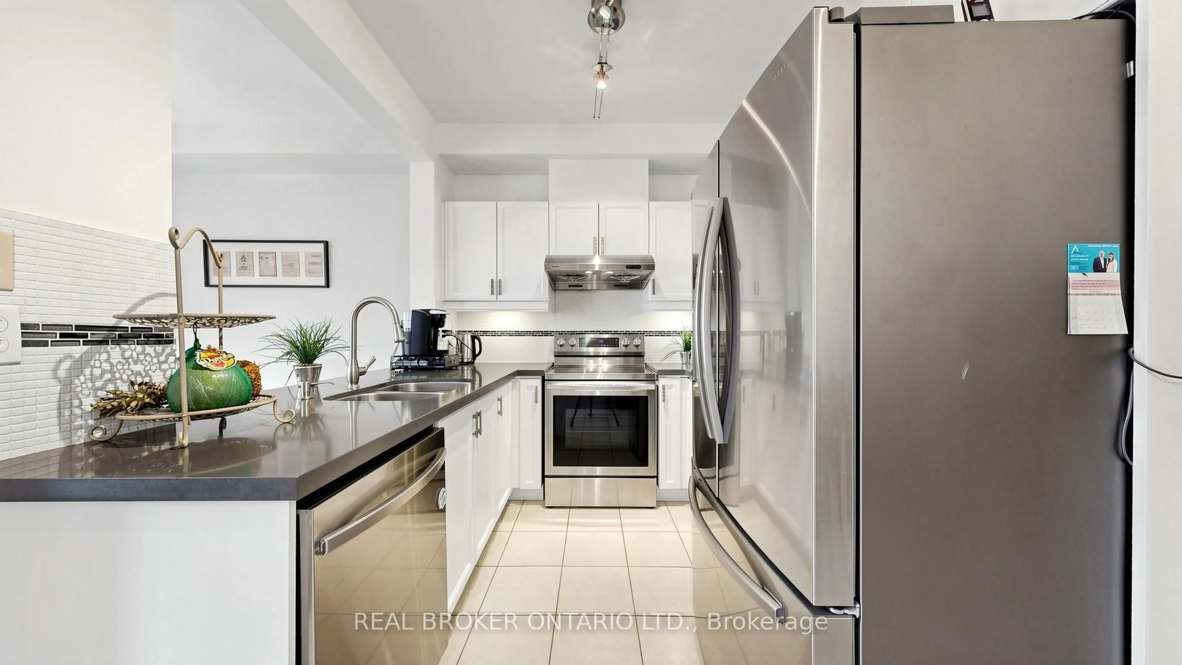 Standard kitchen, ceramic/tile floor for 23 Piera Gdns, Markham Ontario L3R 5G8