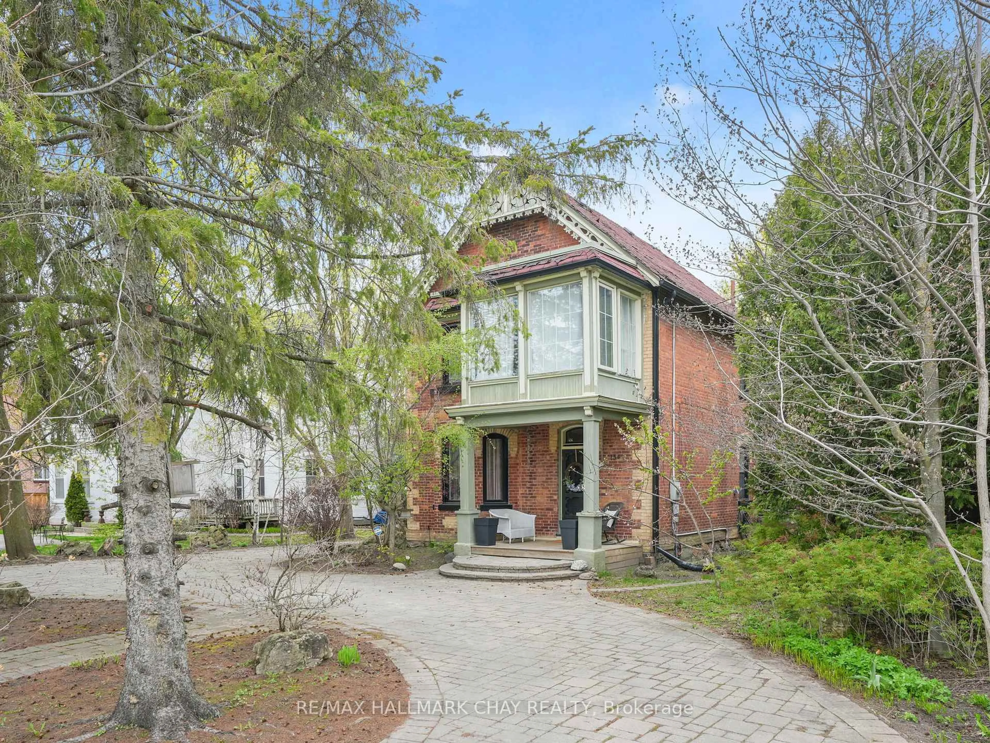 Home with brick exterior material, street for 134 Victoria St, New Tecumseth Ontario L9R 1K6