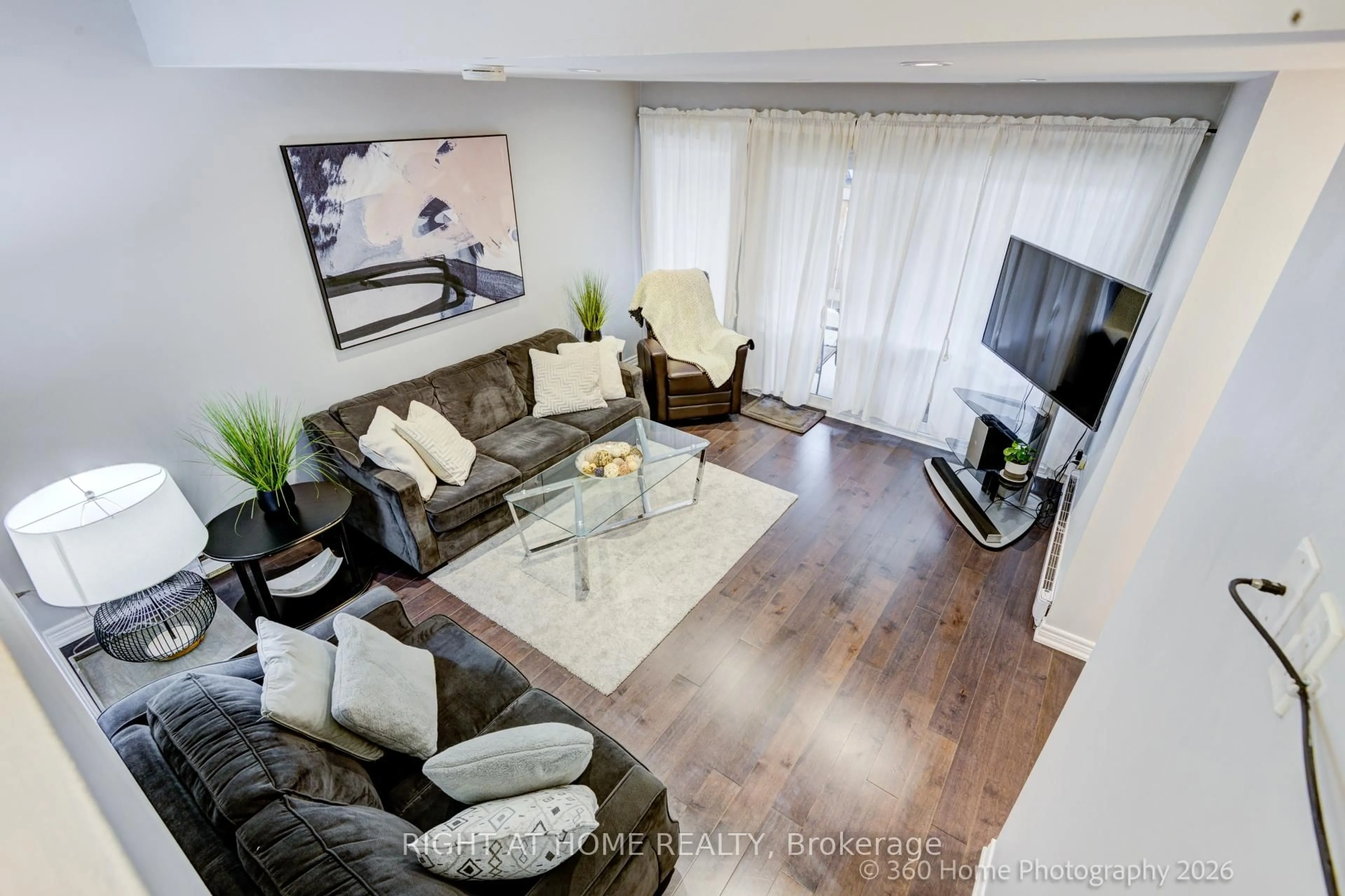 Living room with furniture, wood/laminate floor for 221 Milestone Cres #80, Aurora Ontario L4G 3M2