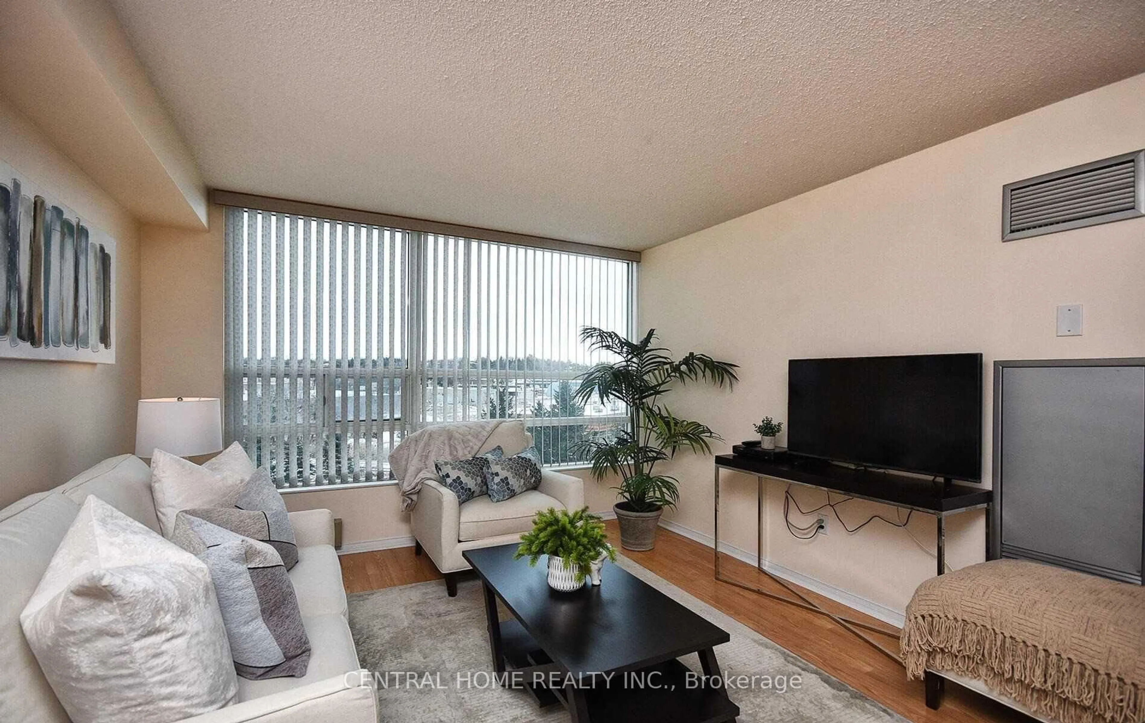 Living room with furniture, wood/laminate floor for 7825 Bayview Ave #502, Markham Ontario L3T 7N2