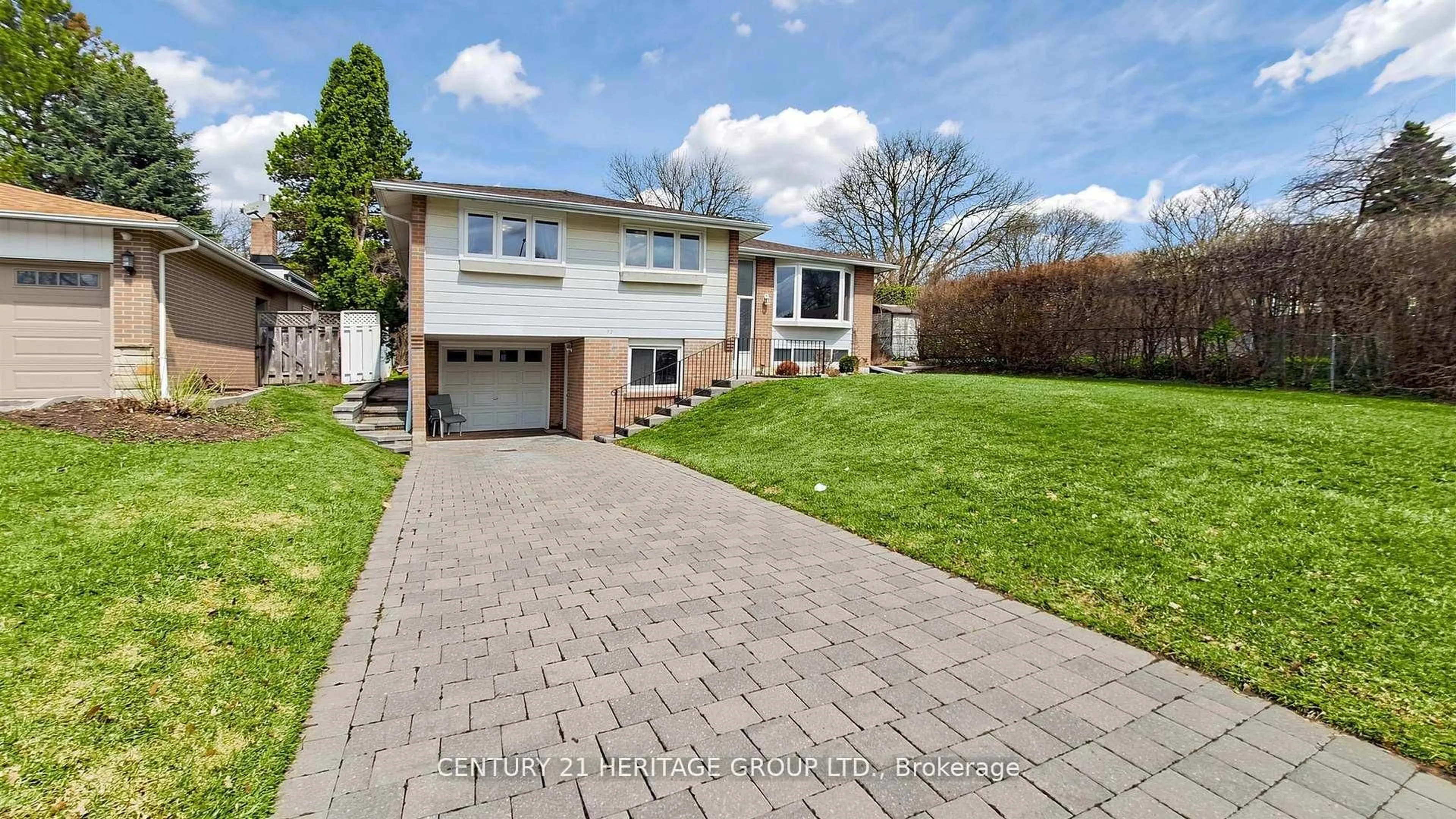 Home with brick exterior material, street for 72 Romfield Crct, Markham Ontario L3T 3H6