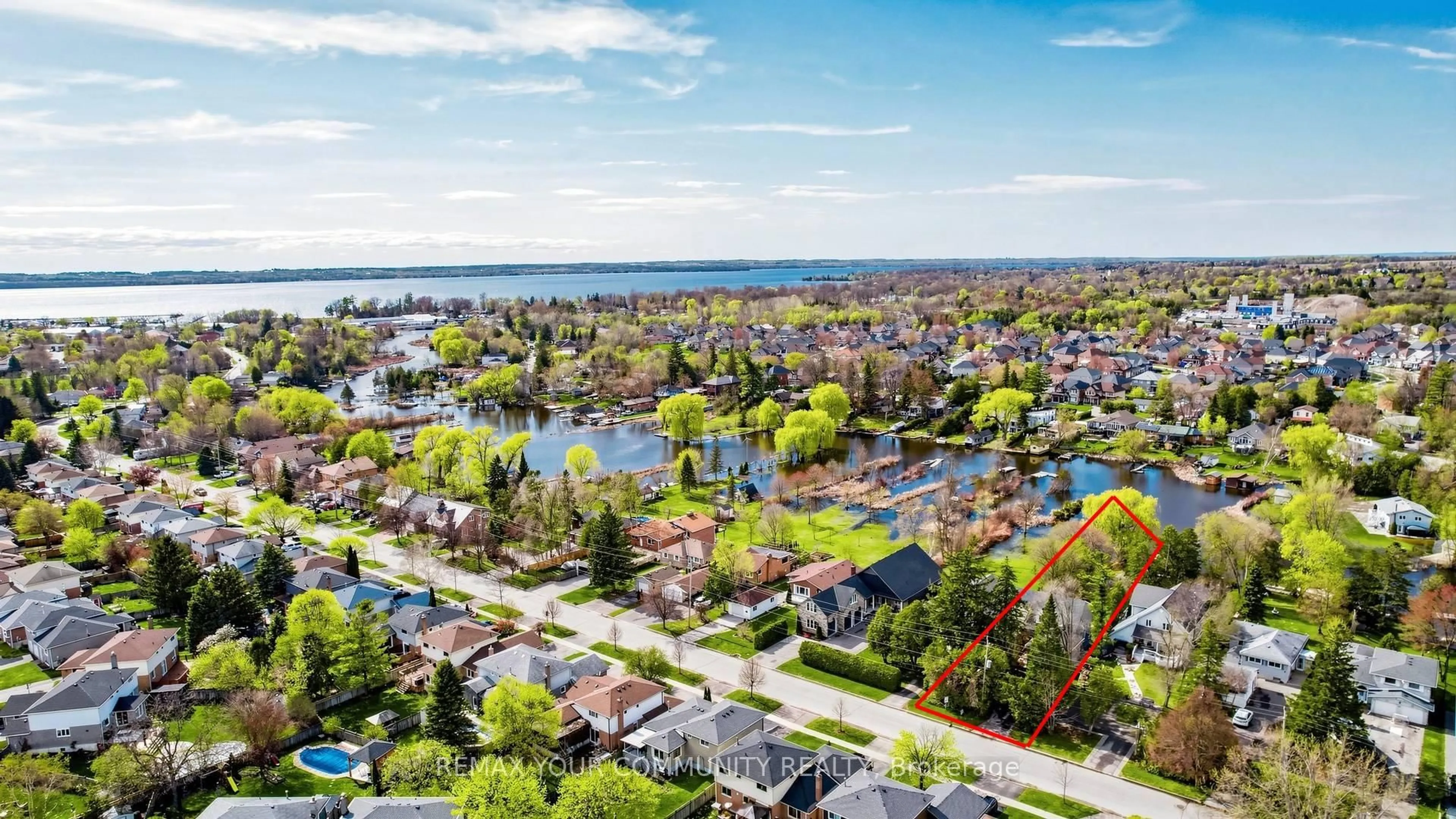 A pic from outside/outdoor area/front of a property/back of a property/a pic from drone, water/lake/river/ocean view for 50 Riverglen Dr, Georgina Ontario L4P 2R1