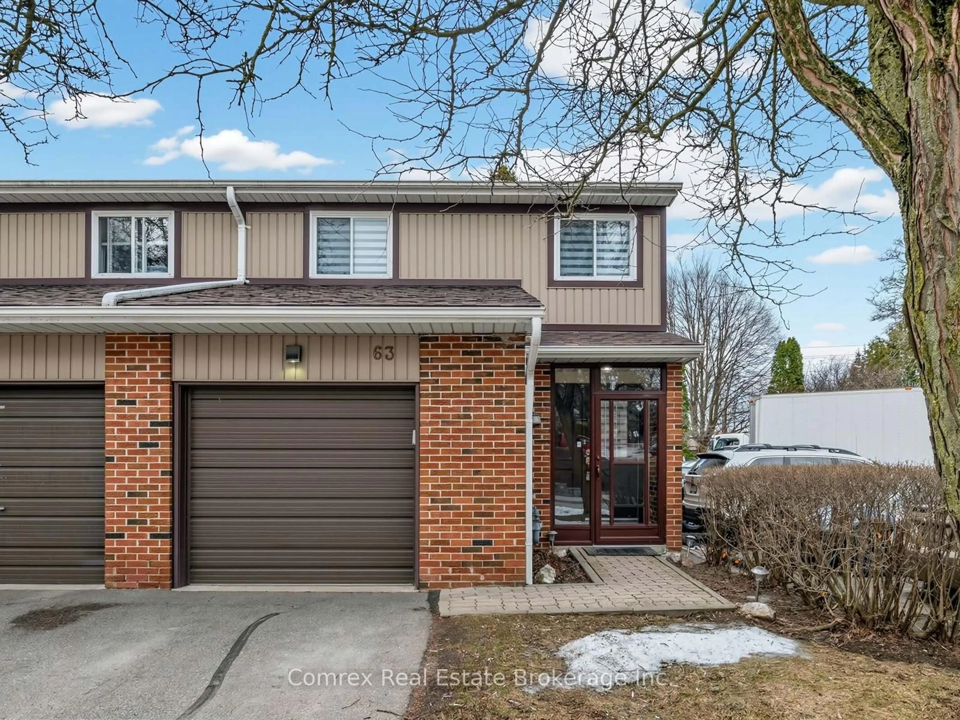Home with brick exterior material, street for 63 Kindale Way, Markham Ontario L3T 4Z2