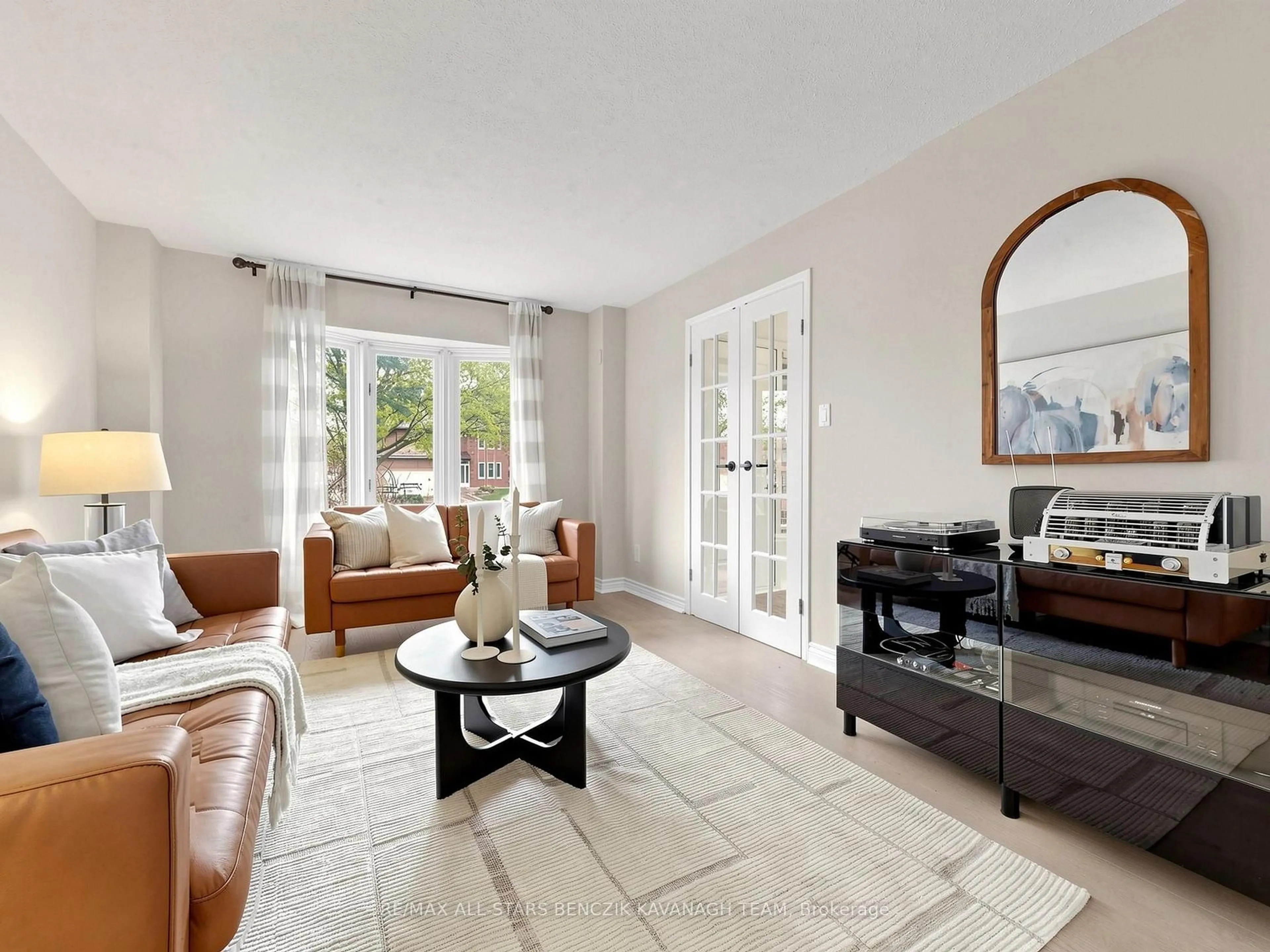 Living room with furniture, ceramic/tile floor for 215 Fincham Ave, Markham Ontario L3P 4B4