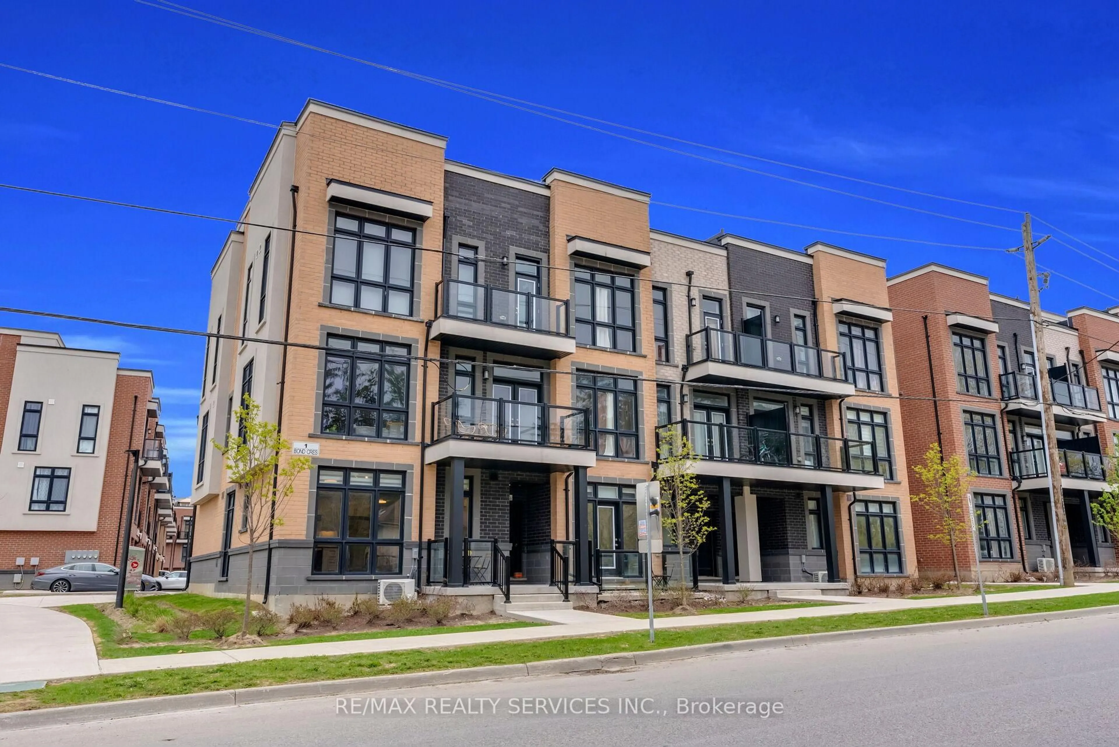 Home with brick exterior material, street for 1 Bond Cres #5, Richmond Hill Ontario L4E 1J4