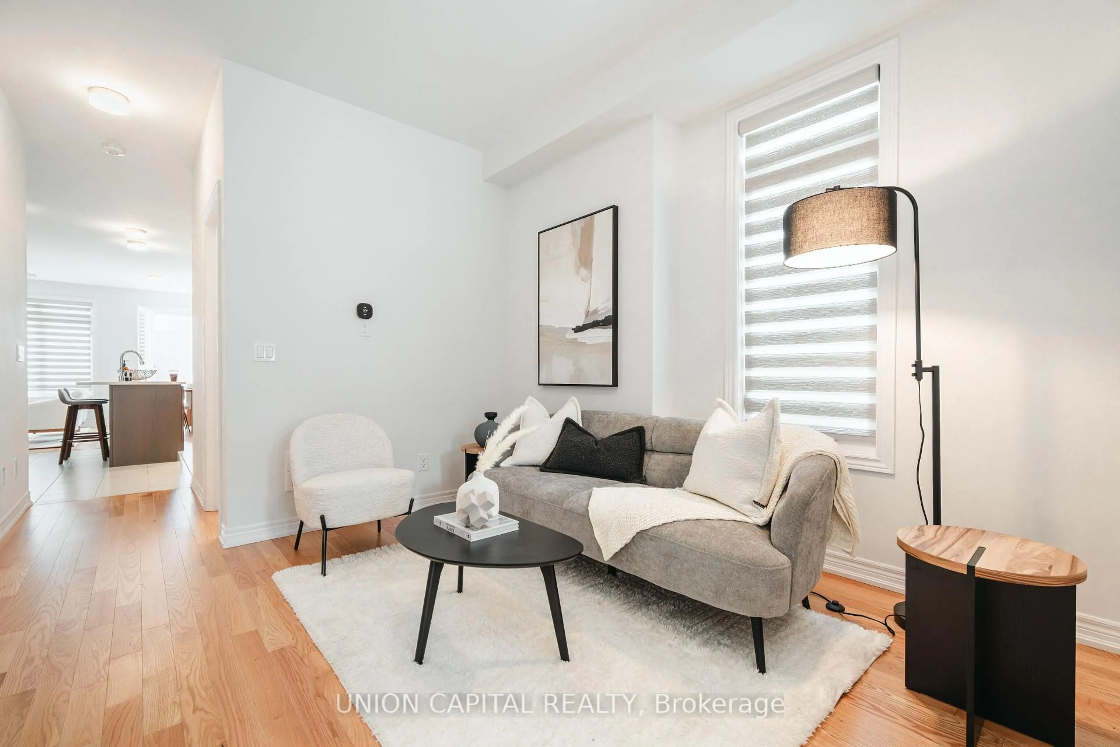 Living room with furniture, wood/laminate floor for 4 Flower Garden Tr, Whitchurch-Stouffville Ontario L4A 4V4