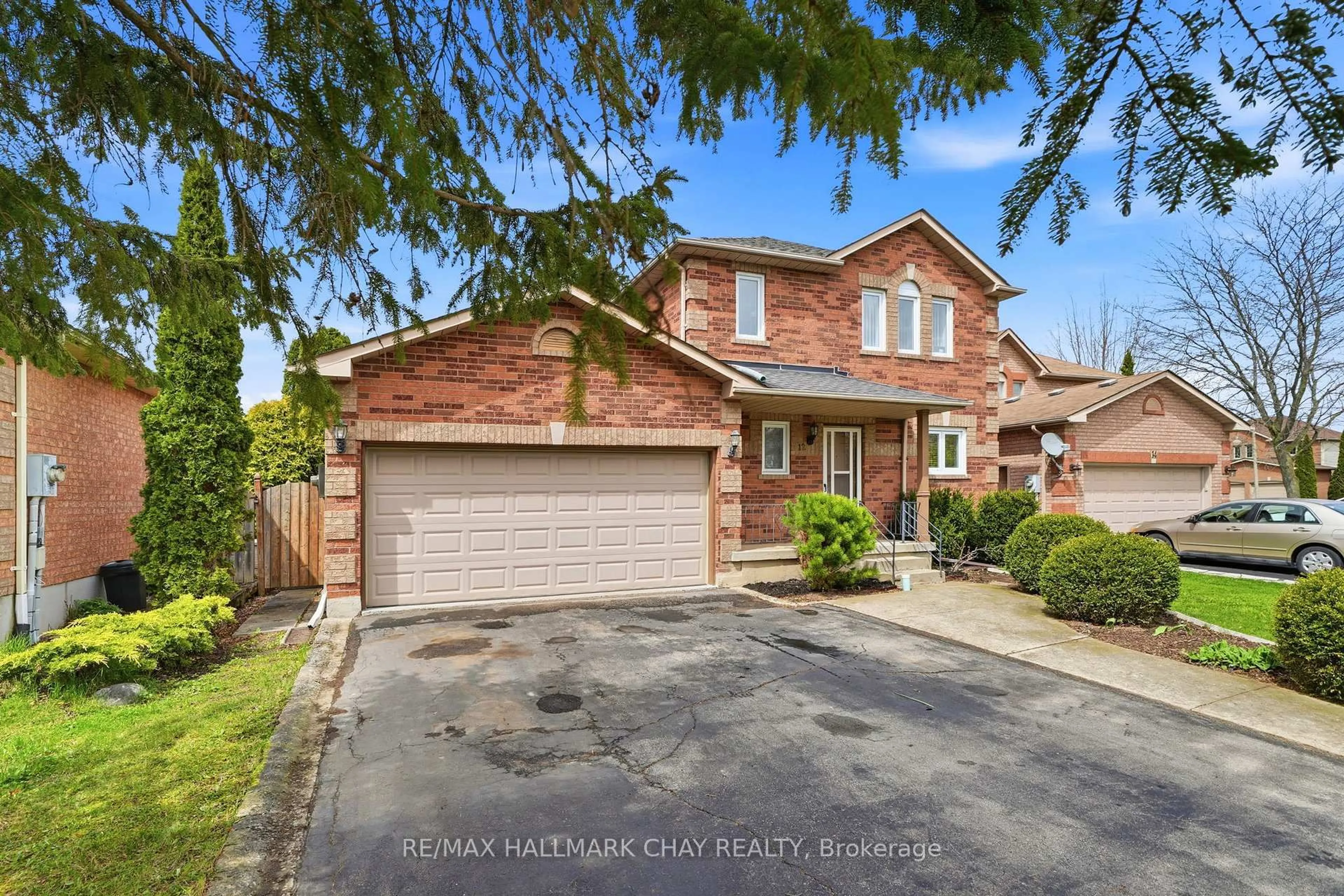 Home with brick exterior material, street for 12 Dugdale Ave, New Tecumseth Ontario L0G 1A0