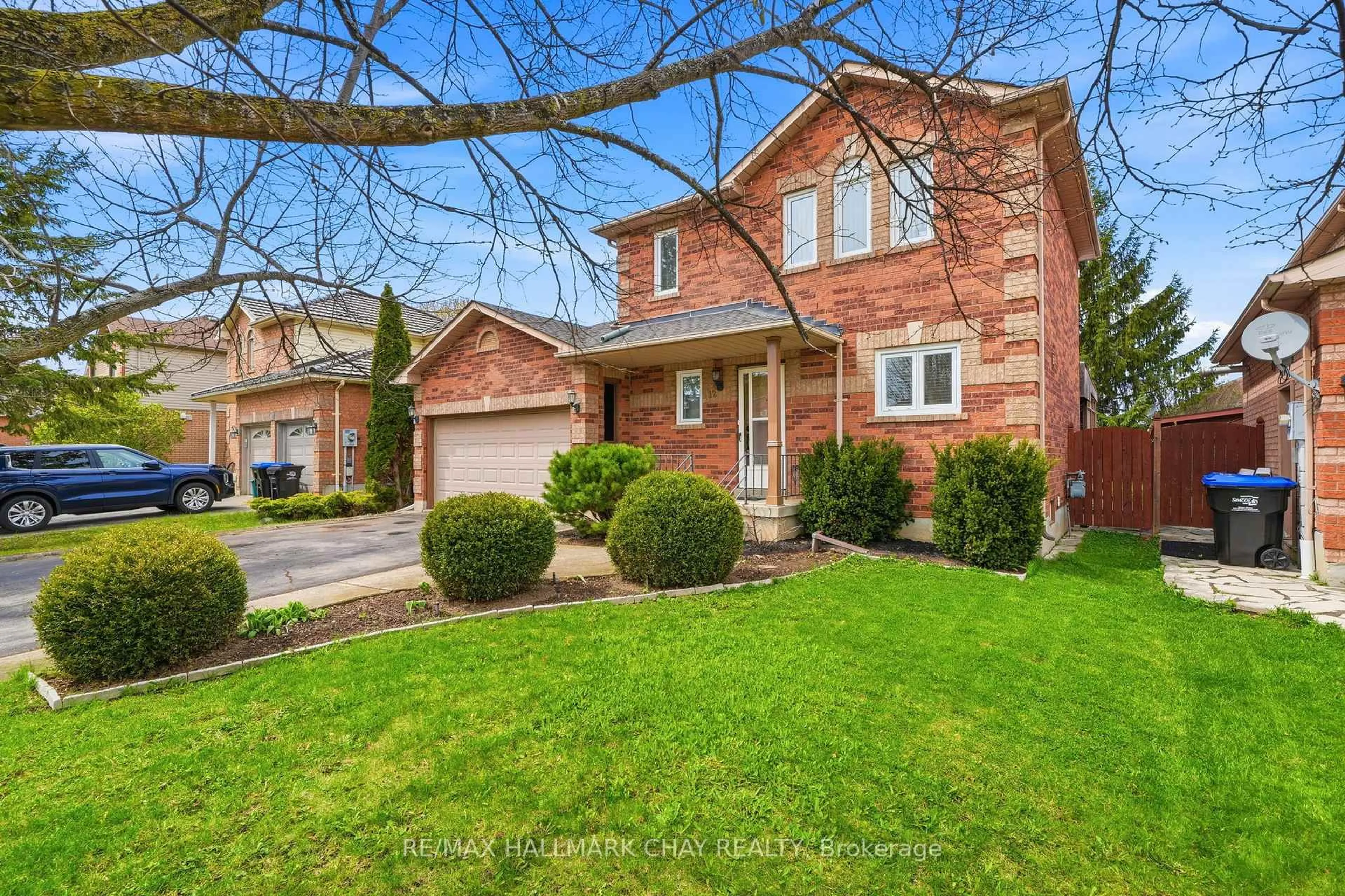 Home with brick exterior material, street for 12 Dugdale Ave, New Tecumseth Ontario L0G 1A0