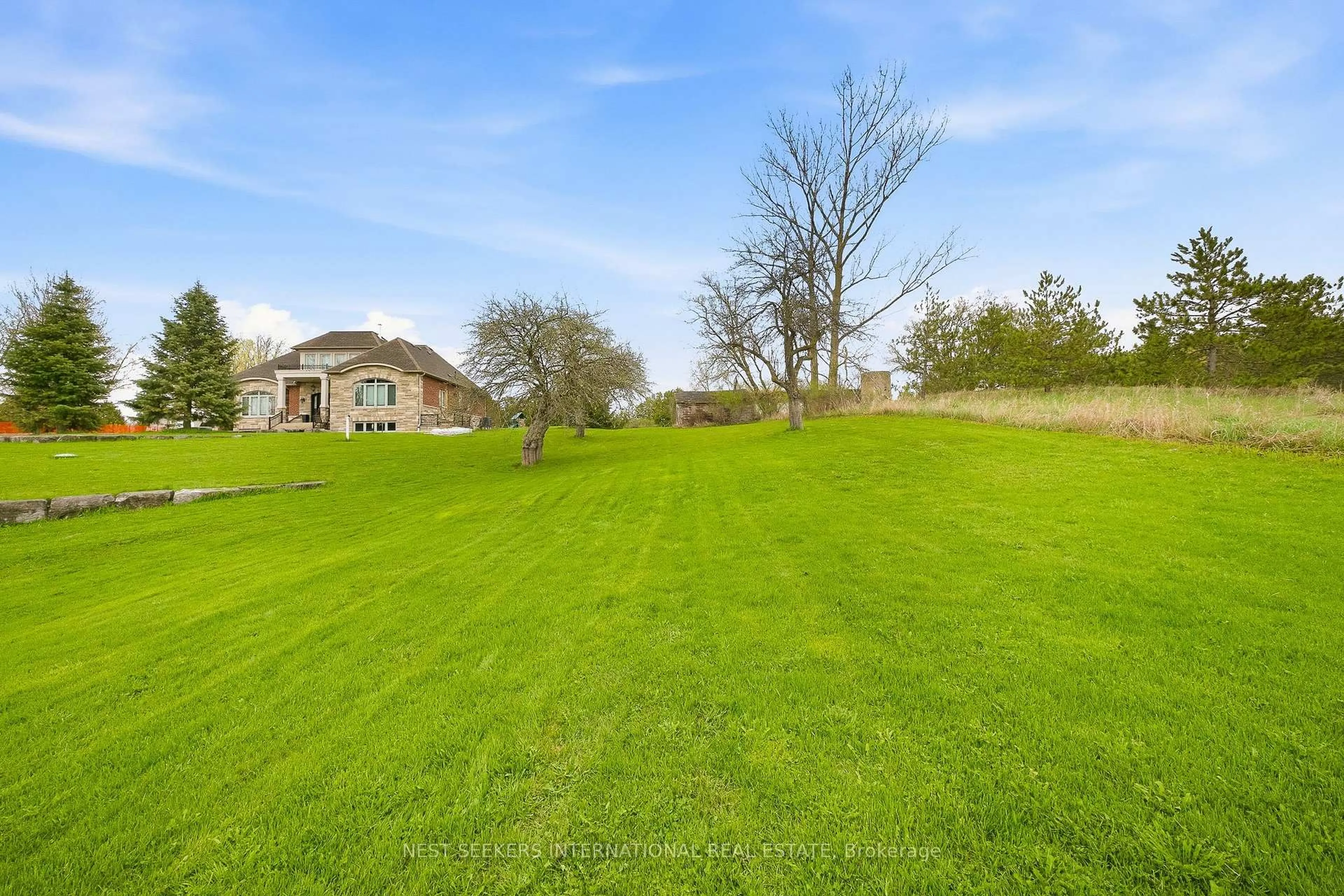 A pic from outside/outdoor area/front of a property/back of a property/a pic from drone, water/lake/river/ocean view for 14155 Highway 27, King Ontario L0G 1T0