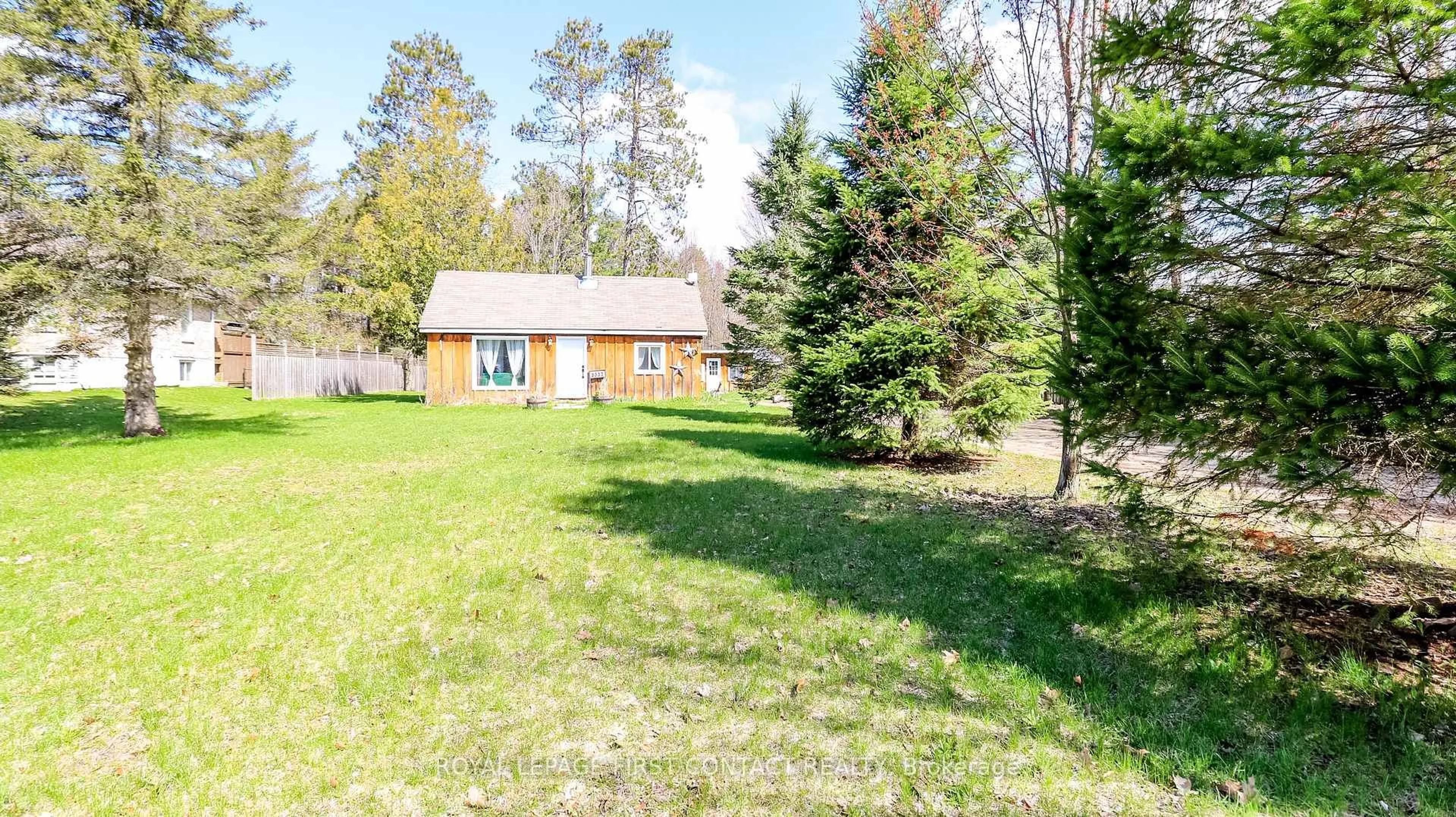 A pic from outside/outdoor area/front of a property/back of a property/a pic from drone, forest/trees view for 8332 Main St, Adjala-Tosorontio Ontario L0M 1M0