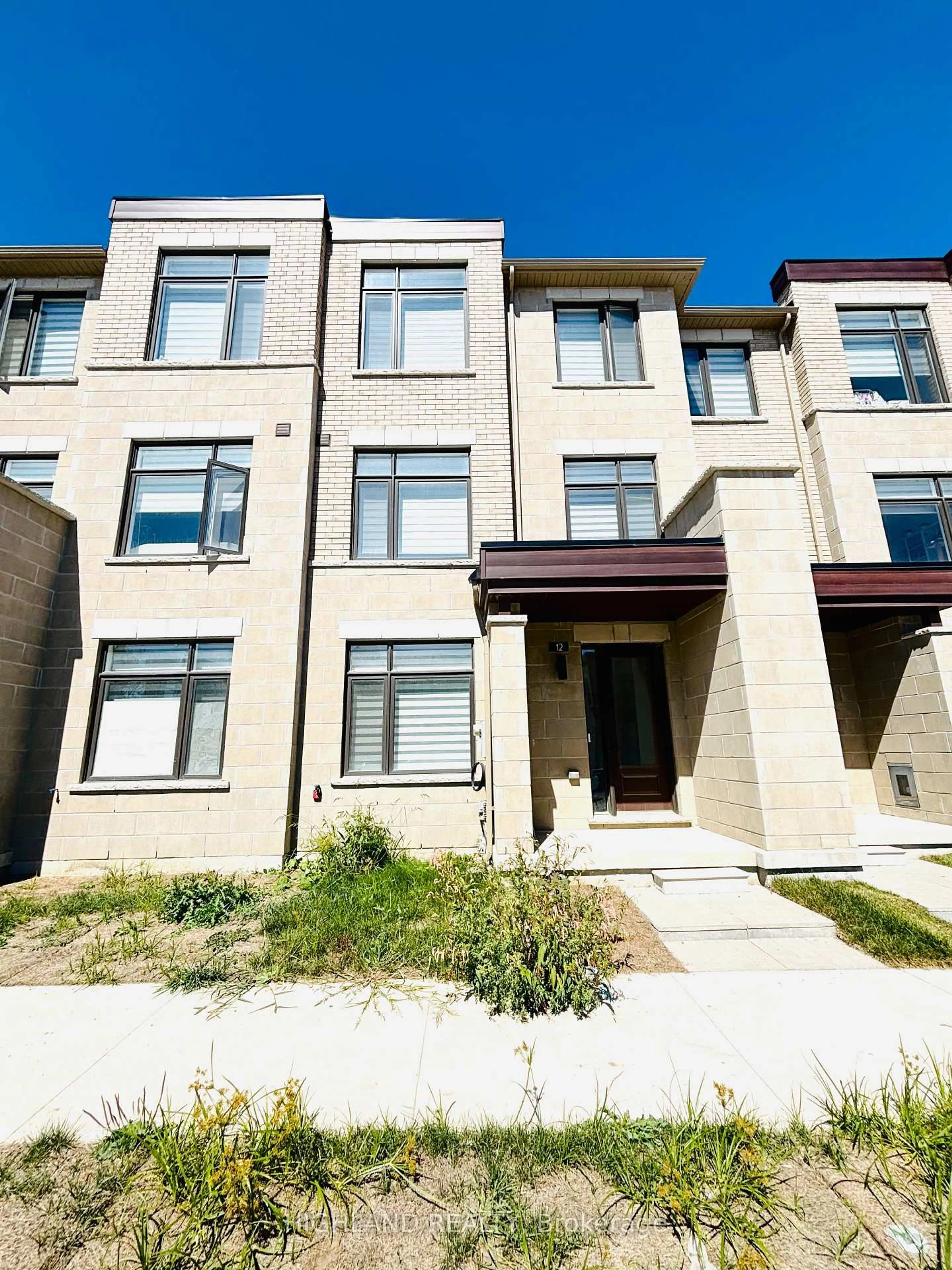 Home with brick exterior material, street for 12 Robert Eaton Ave, Markham Ontario L3S 0G3