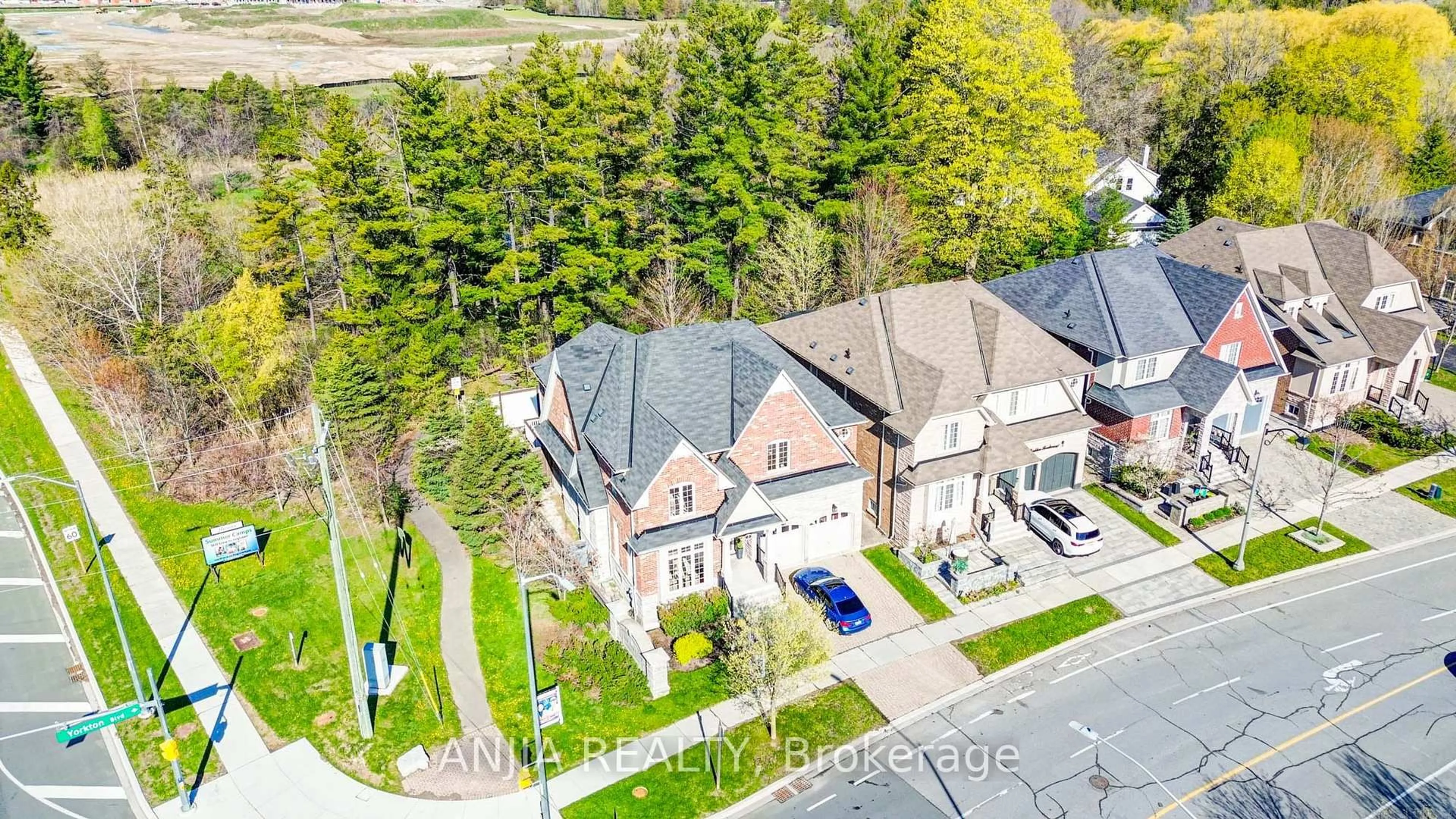 A pic from outside/outdoor area/front of a property/back of a property/a pic from drone, street for 2 Yorkton Blvd, Markham Ontario L6C 0J9