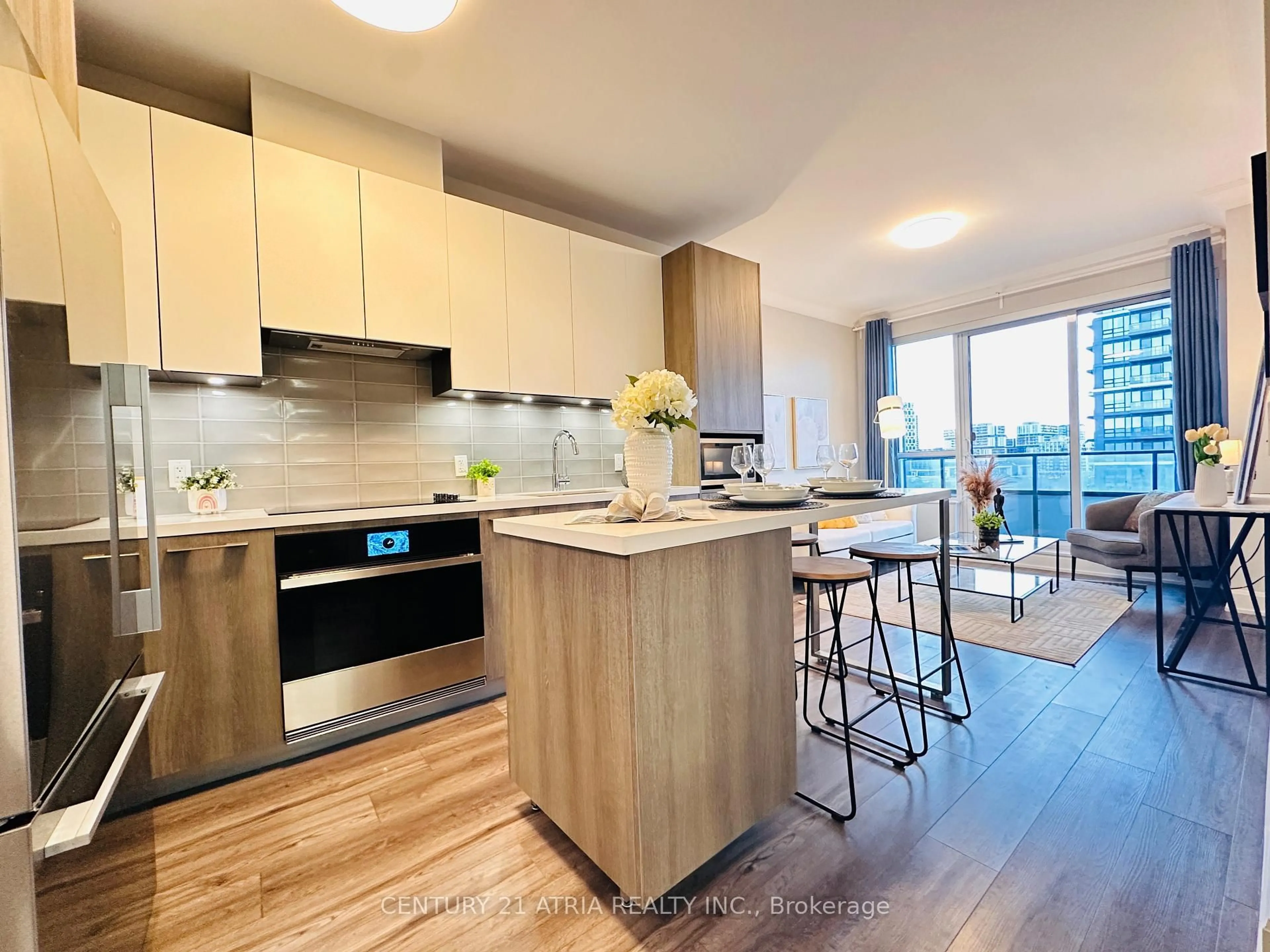 Open concept kitchen, wood/laminate floor for 38 Water Walk Dr #902, Markham Ontario L3R 6M8