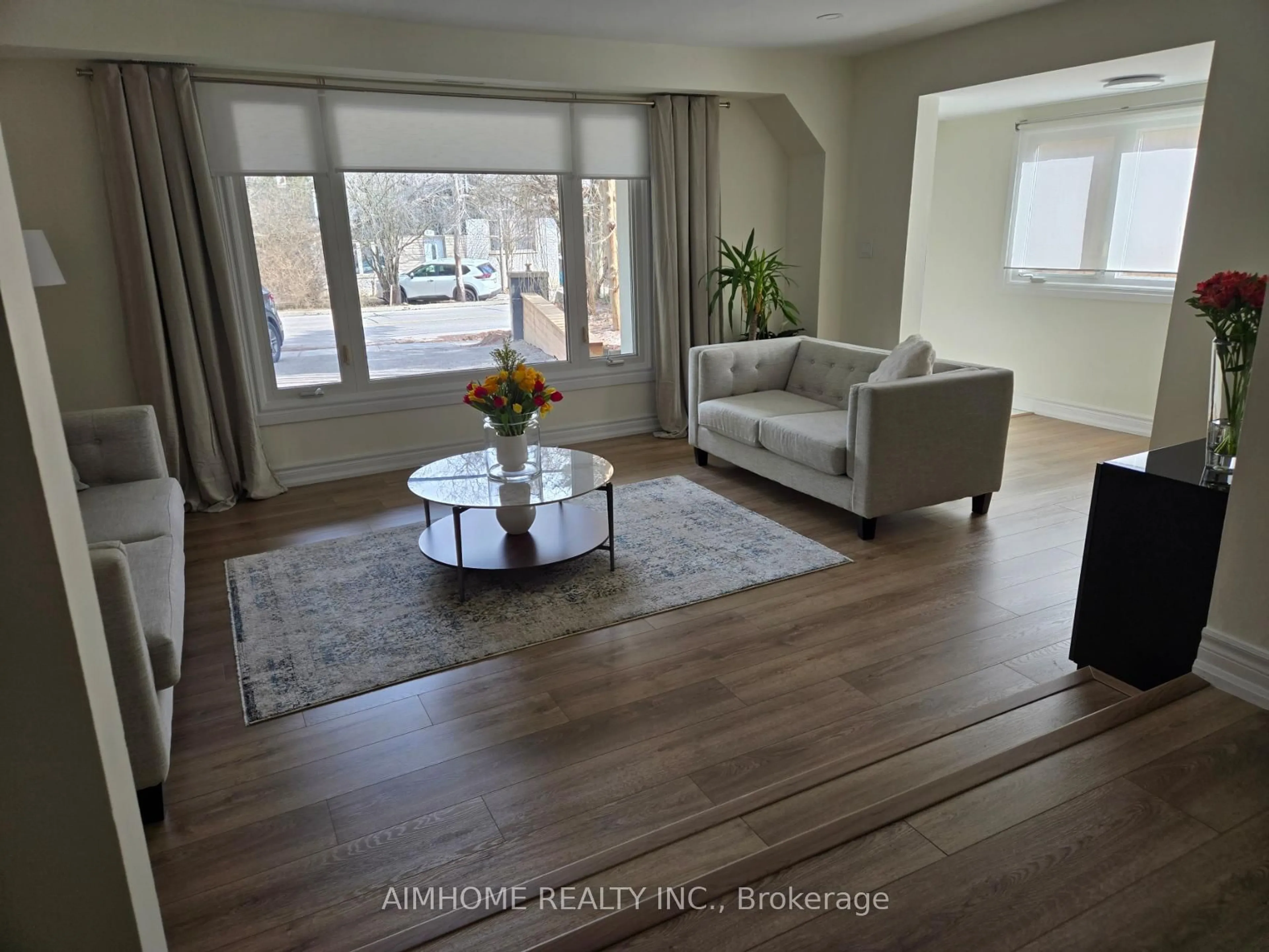 Living room with furniture, wood/laminate floor for 77 Sunset Beach Rd, Richmond Hill Ontario L4E 3G7