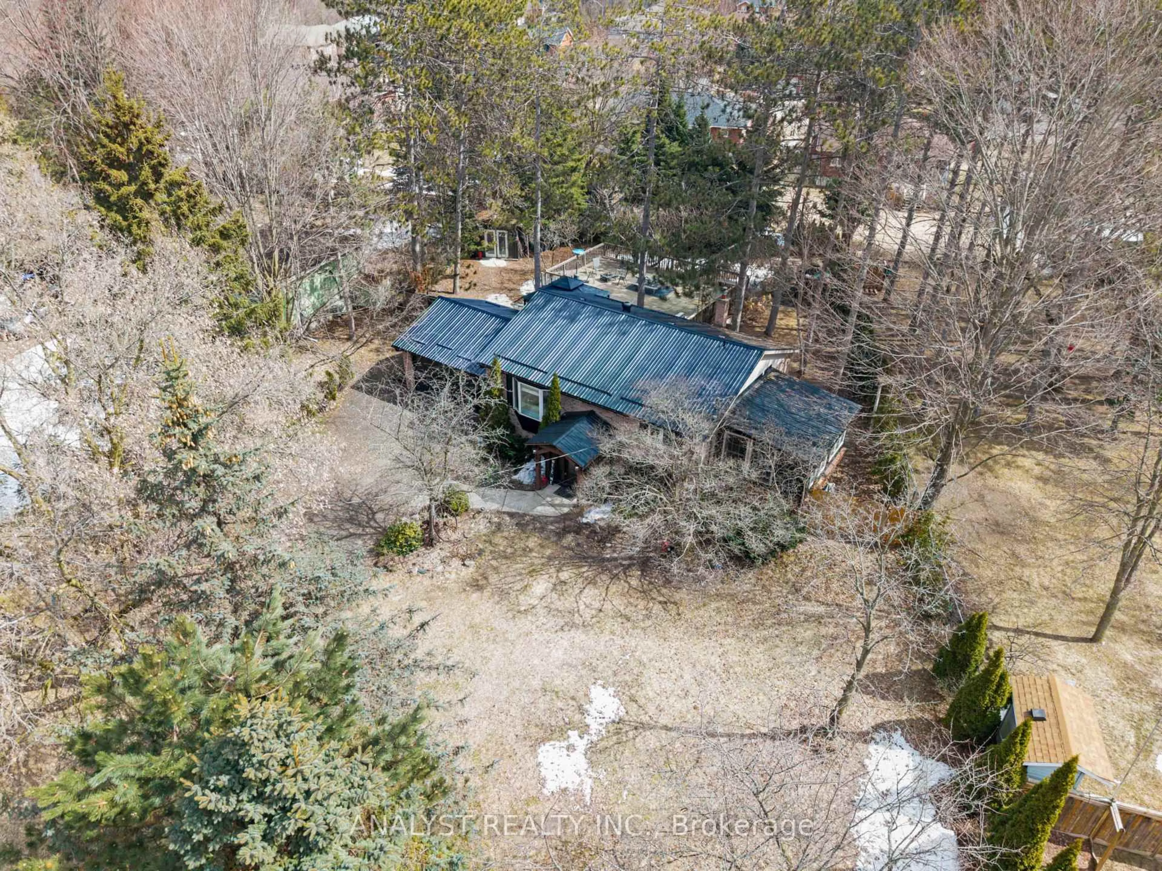 A pic from outside/outdoor area/front of a property/back of a property/a pic from drone, forest/trees view for 19 Pine Park Blvd, Adjala-Tosorontio Ontario L0M 1J0