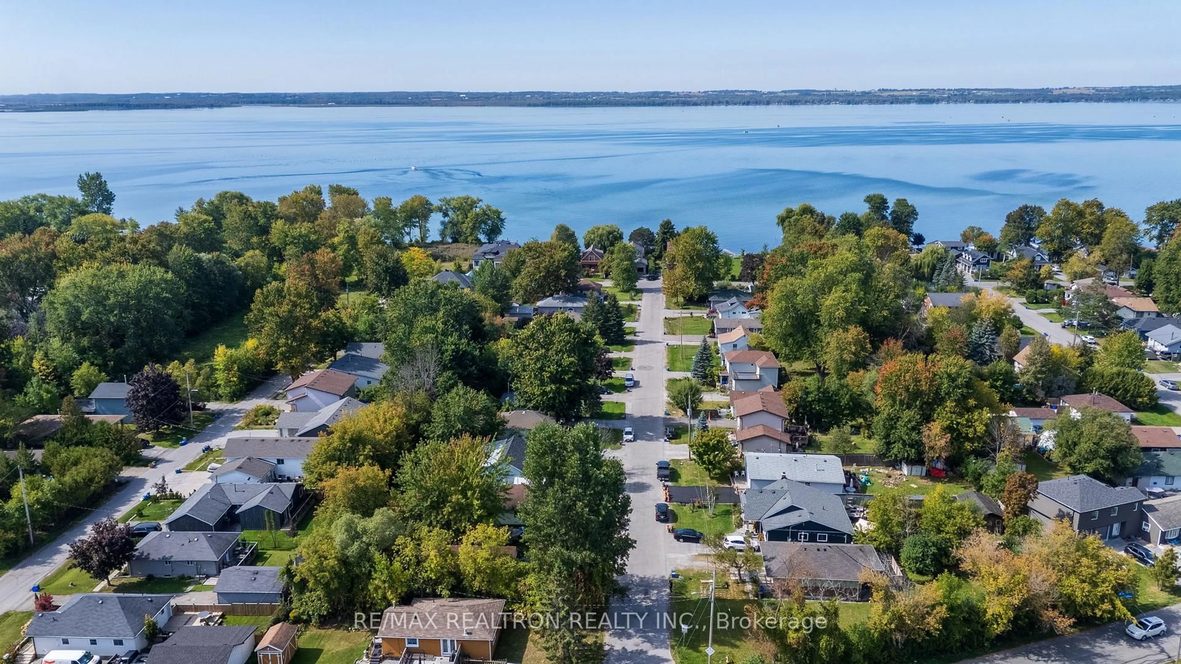 A pic from outside/outdoor area/front of a property/back of a property/a pic from drone, water/lake/river/ocean view for 183 Beach Rd, Georgina Ontario L4P 2L7
