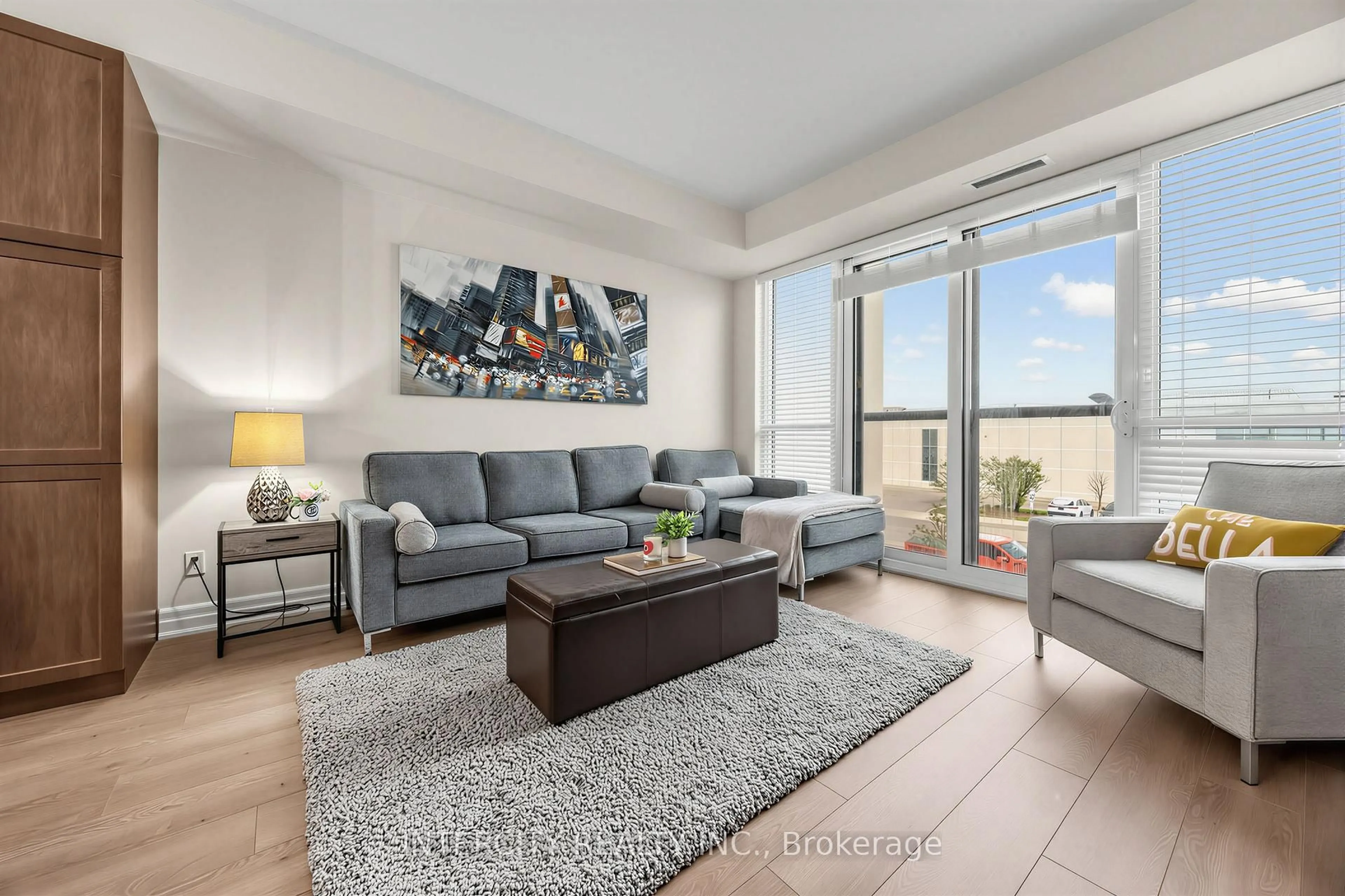 Living room with furniture, unknown for 9075 Jane St #210, Vaughan Ontario L4K 0L7