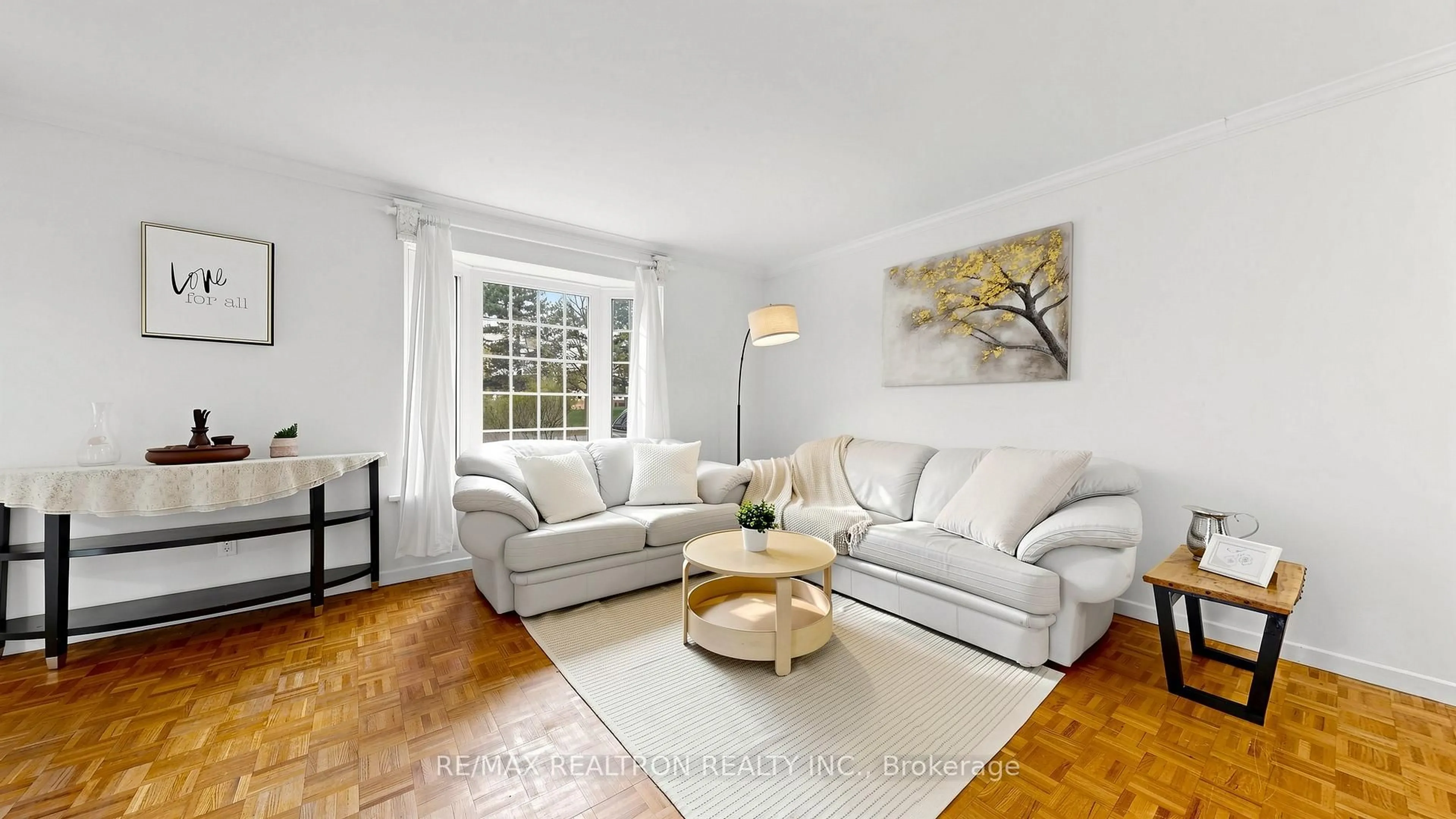 Living room with furniture, wood/laminate floor for 135 Avenue Rd, Richmond Hill Ontario L4C 4Z6