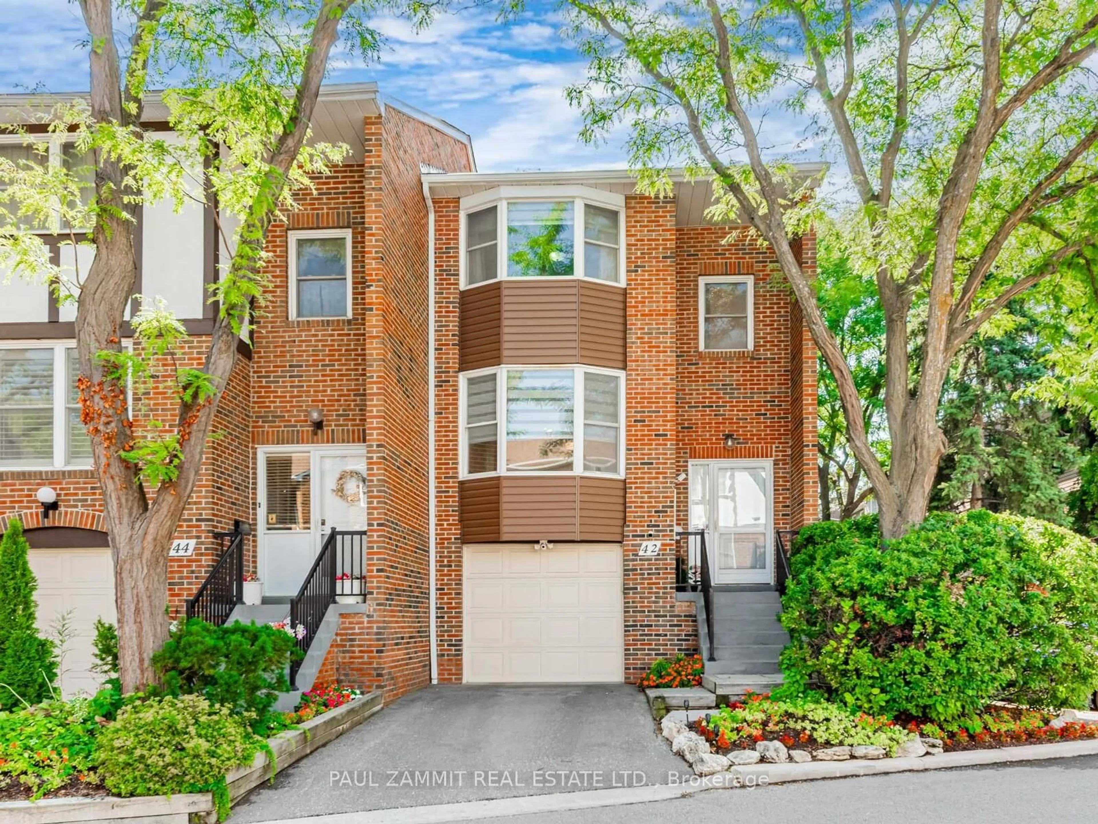 Home with brick exterior material, street for 42 Windsor Court Rd, Markham Ontario L3T 4Y5