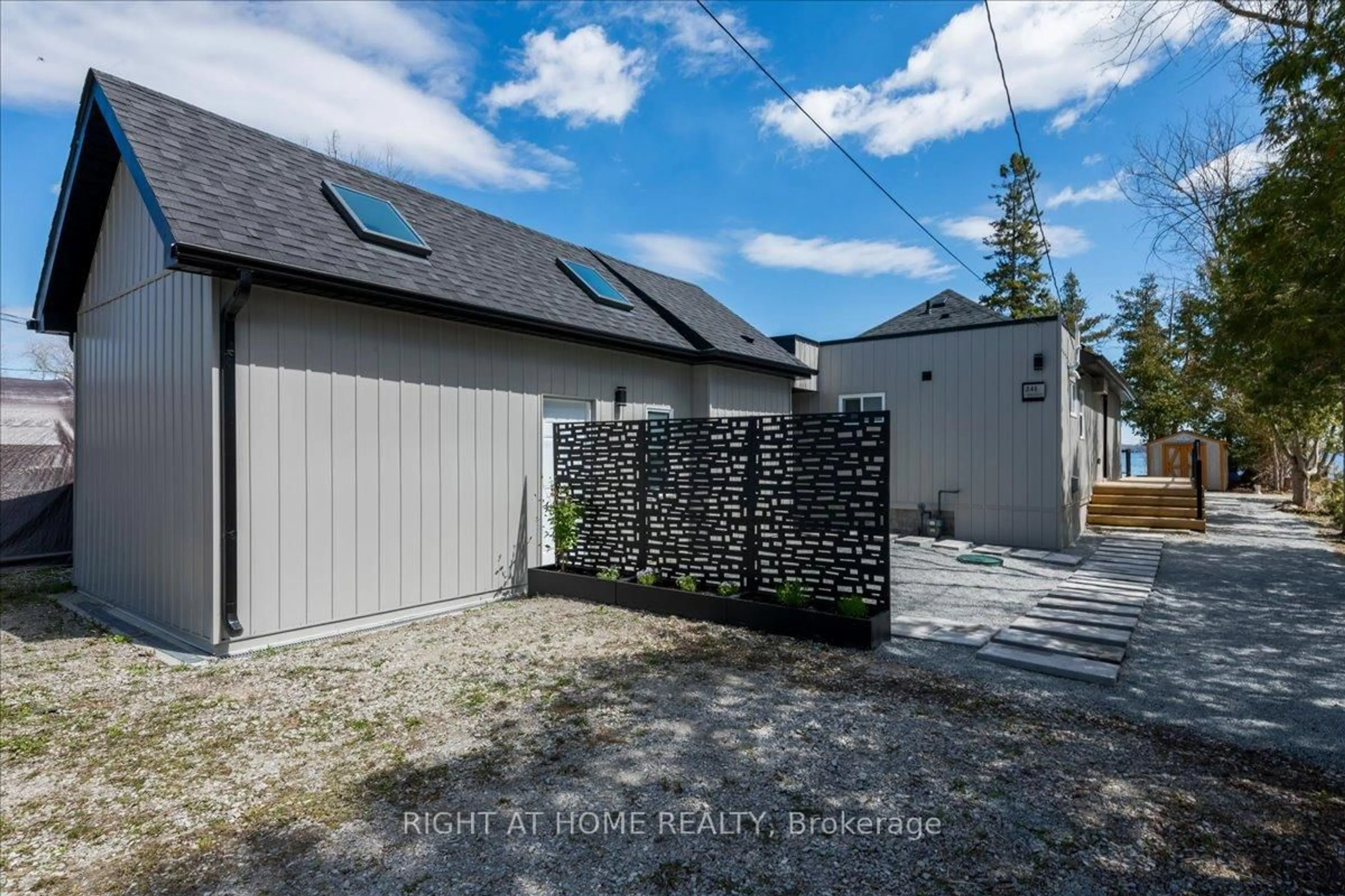 A pic from outside/outdoor area/front of a property/back of a property/a pic from drone, street for 241 Rockaway Beach Pl, Innisfil Ontario L0L 1K0