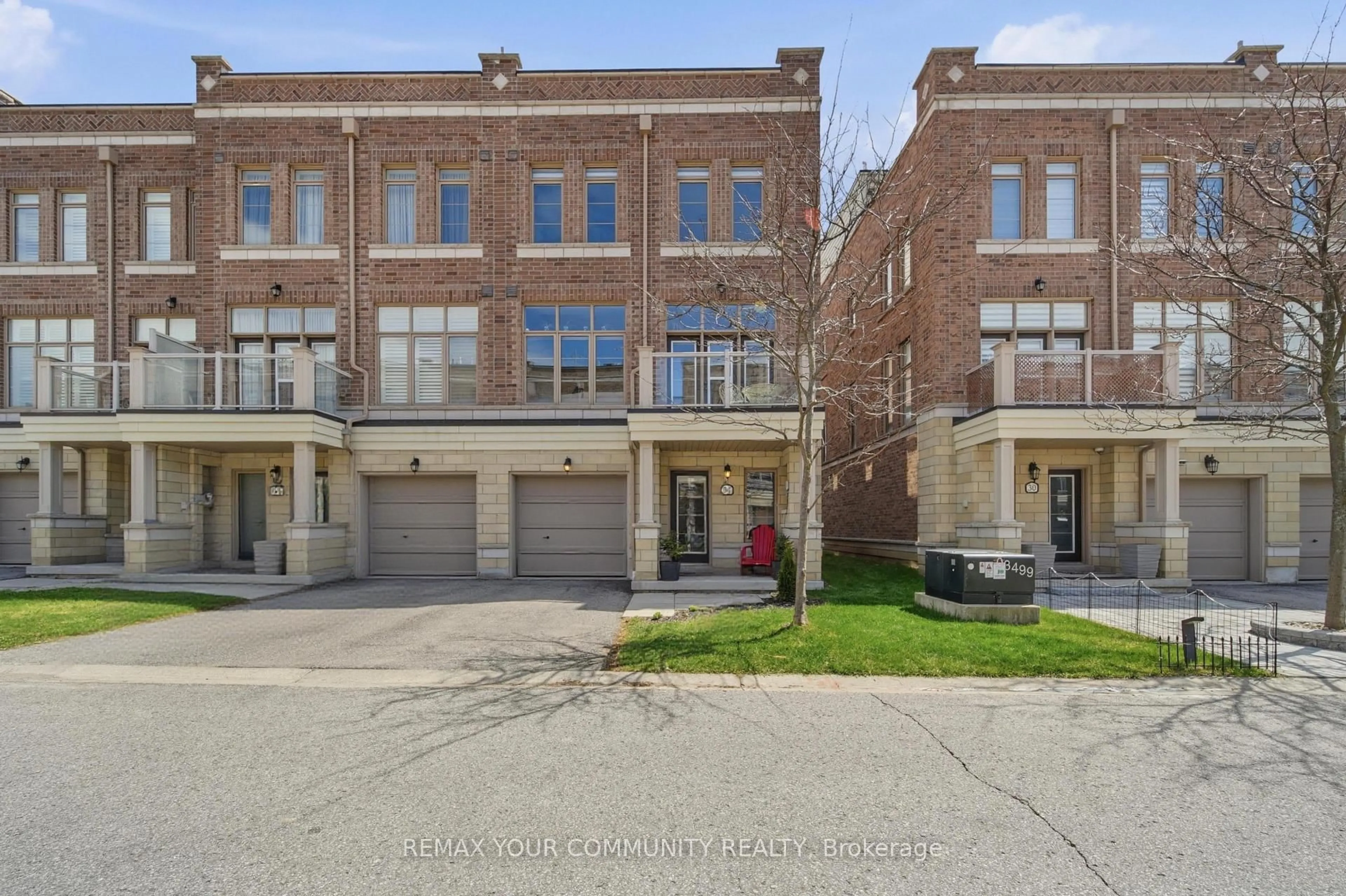 Home with brick exterior material, street for 34 Arborea Lane, Whitchurch-Stouffville Ontario L4A 1X1