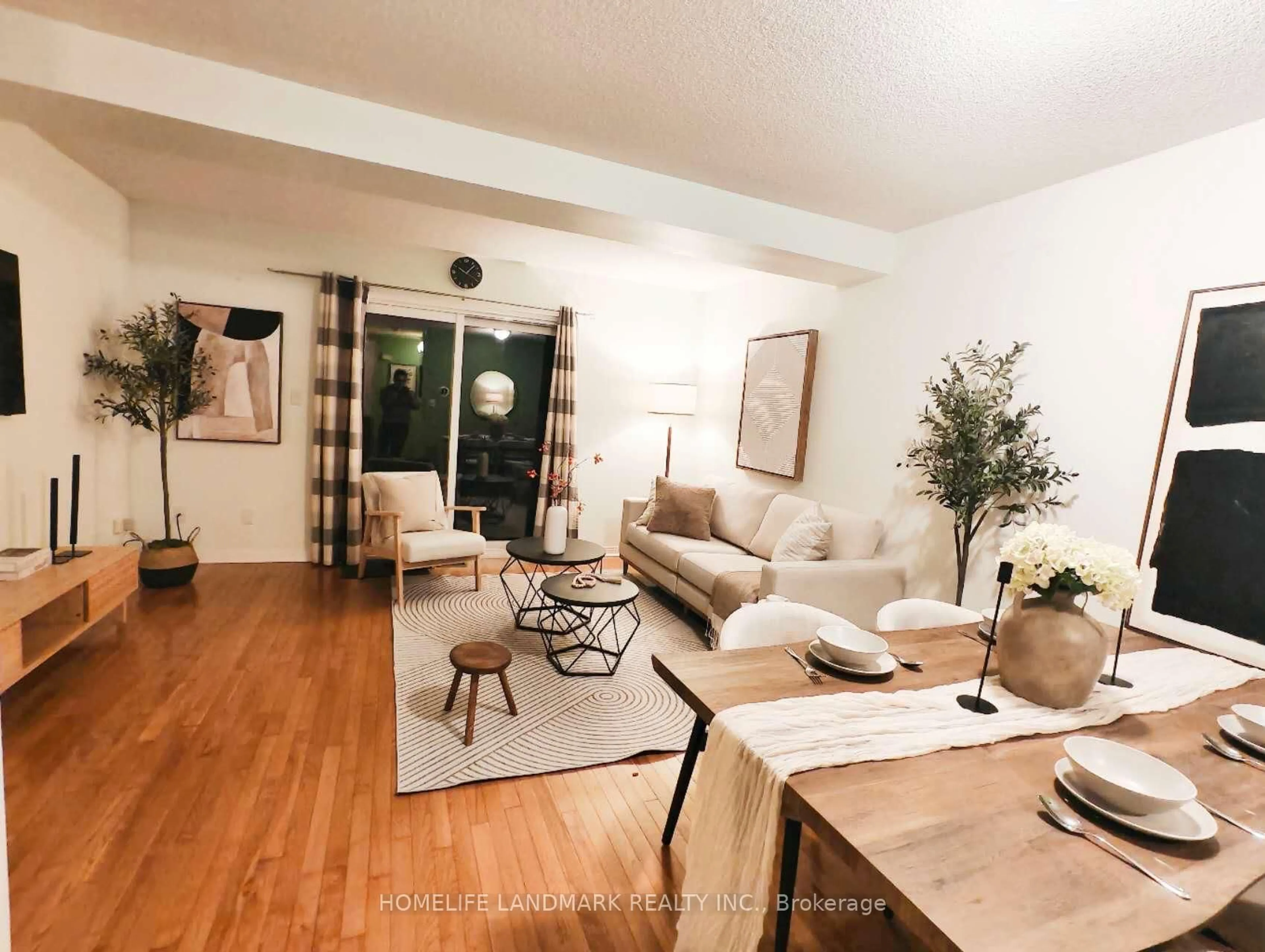 Living room with furniture, wood/laminate floor for 119 William Curtis Circ #57, Newmarket Ontario L3Y 8L8