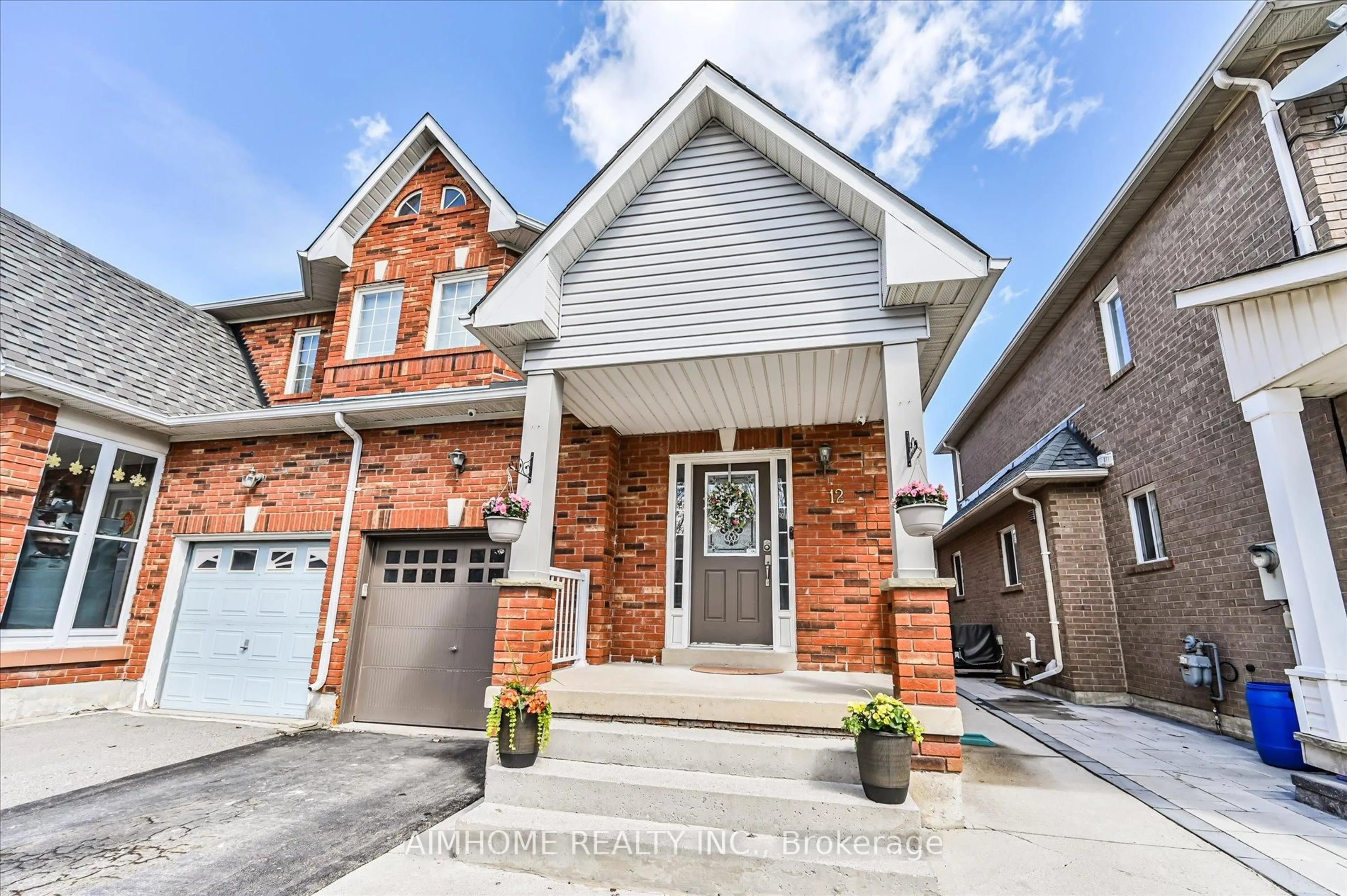 Home with brick exterior material, street for 12 Boxhill Rd, Markham Ontario L3S 4R1