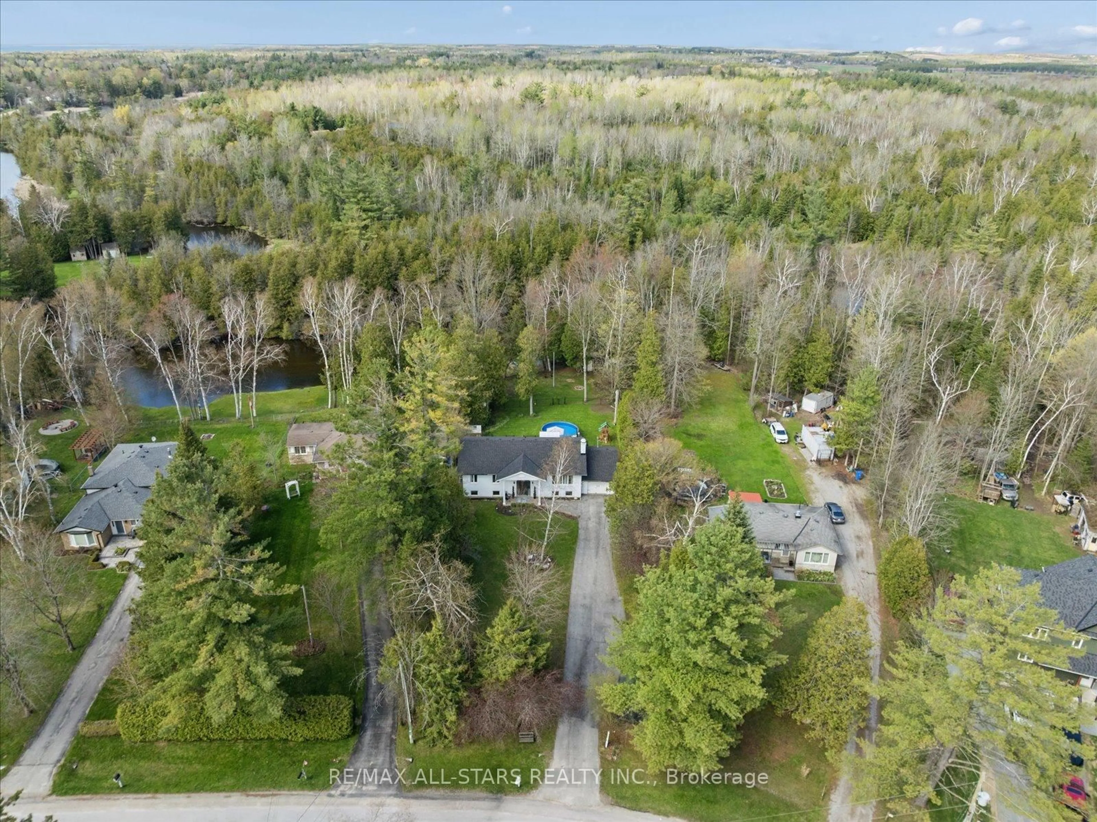 A pic from outside/outdoor area/front of a property/back of a property/a pic from drone, forest/trees view for 127 Pinecrest Rd, Georgina Ontario L0E 1N0
