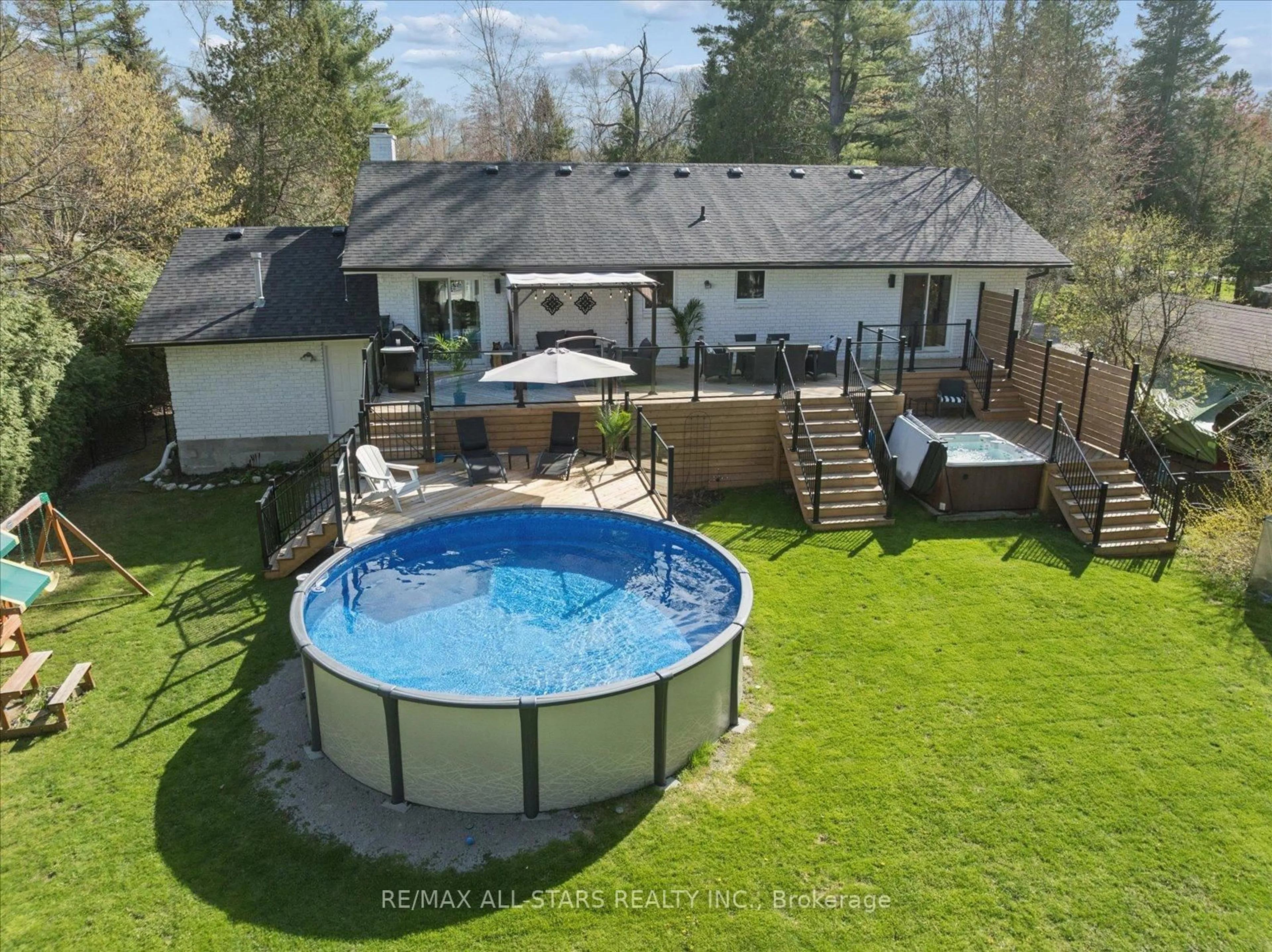 A pic from outside/outdoor area/front of a property/back of a property/a pic from drone, water/lake/river/ocean view for 127 Pinecrest Rd, Georgina Ontario L0E 1N0