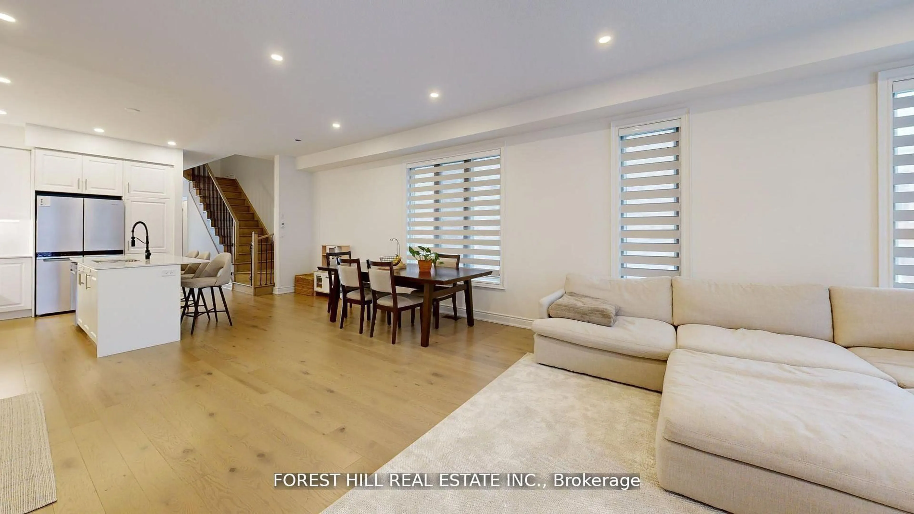Living room with furniture, wood/laminate floor for 54 Montrose Blvd, Bradford West Gwillimbury Ontario L3Z 4P3