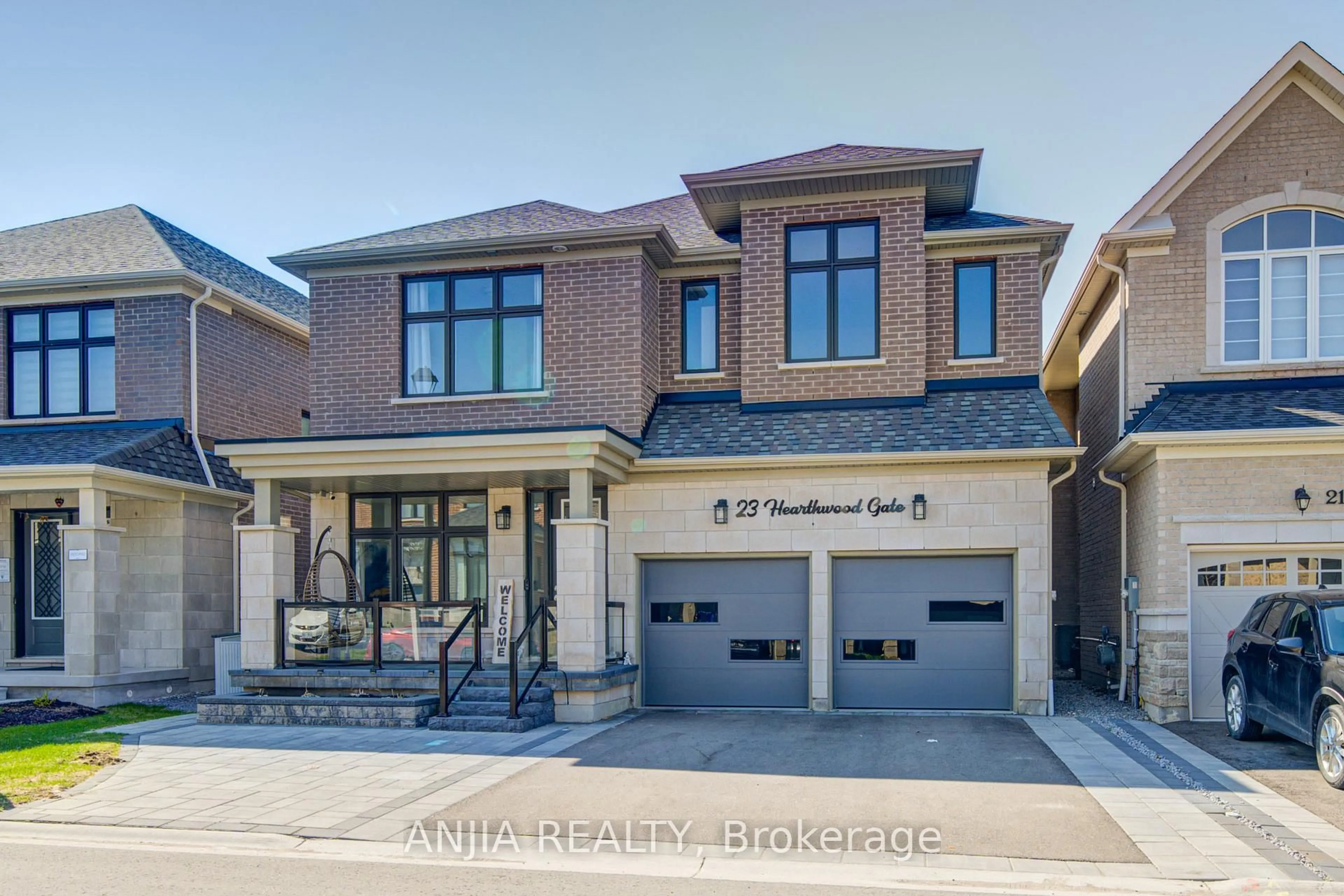 Home with brick exterior material, street for 23 Hearthwood Gate, Whitchurch-Stouffville Ontario L4A 4X1