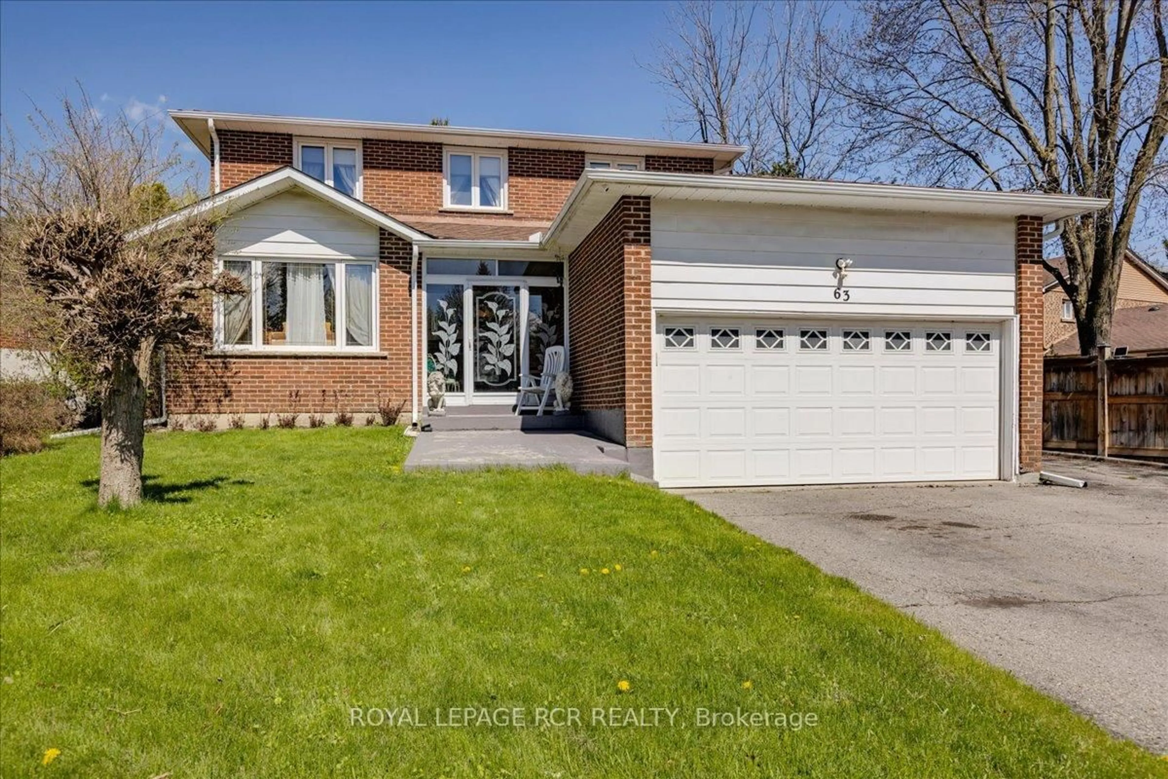 Home with brick exterior material, street for 63 Portland Cres, Newmarket Ontario L3Y 6A6