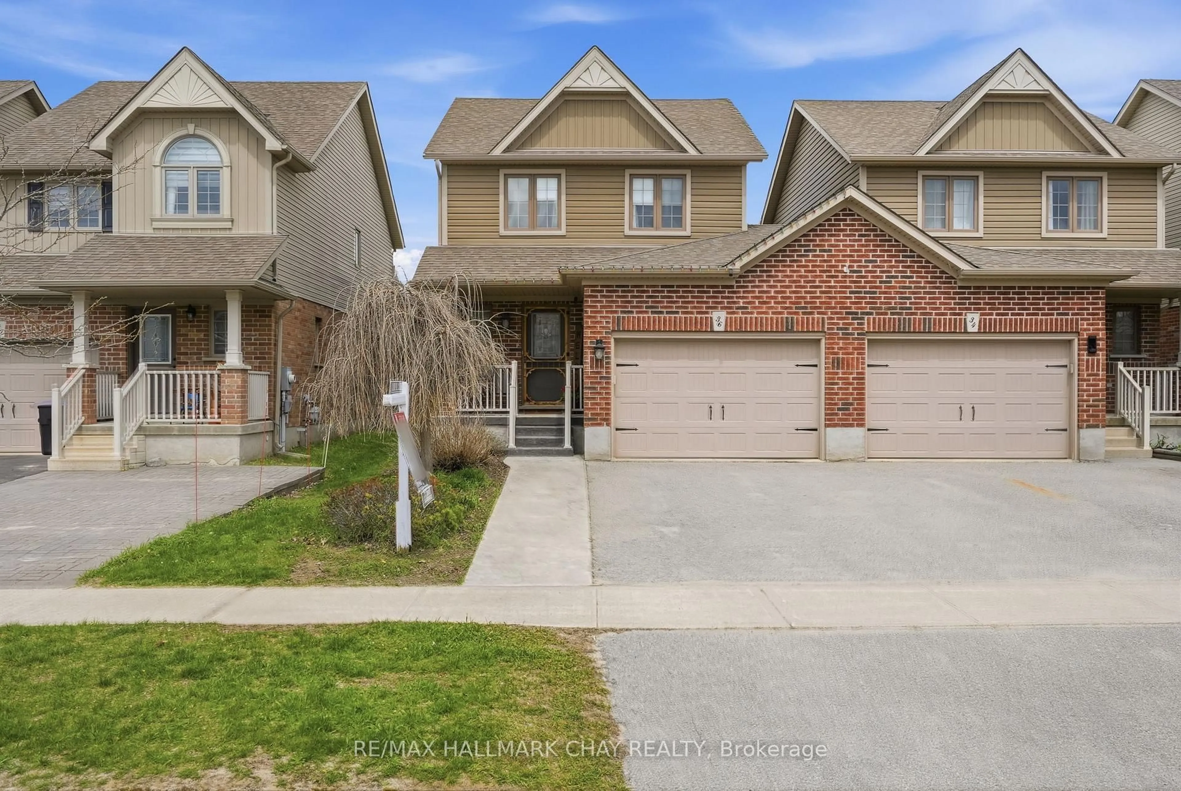 Home with brick exterior material, street for 36 Quigley St, Essa Ontario L3W 0P3