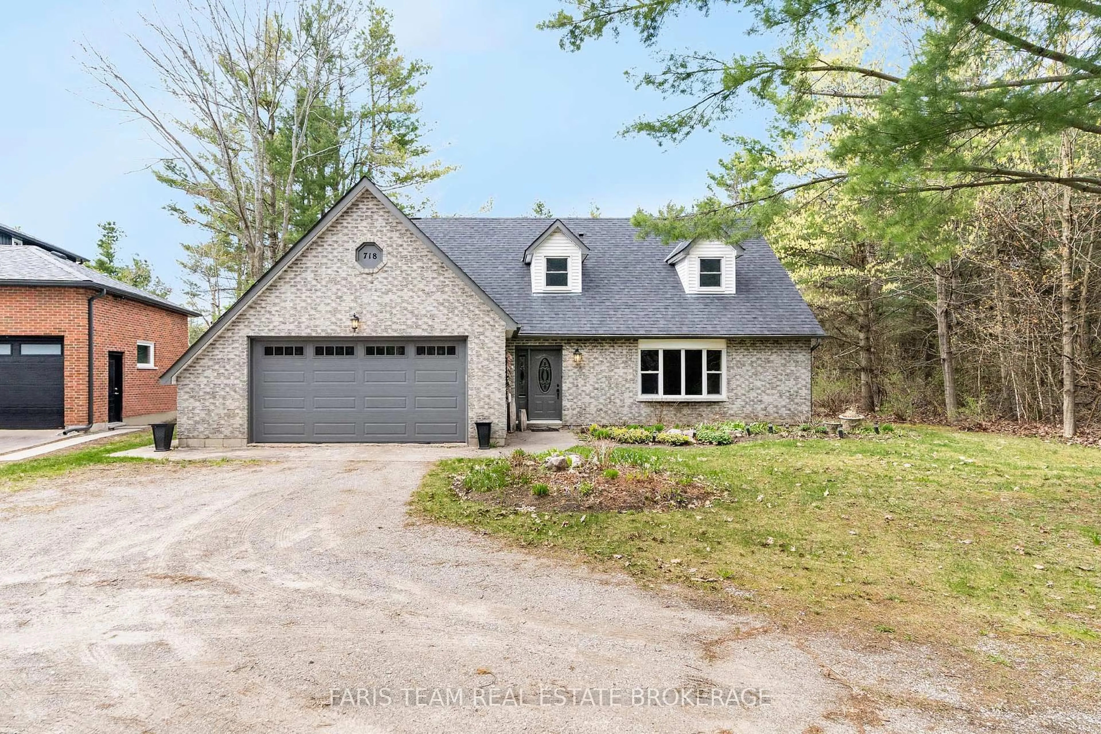 Home with brick exterior material, street for 718 Henderson Dr, Innisfil Ontario L9S 2J8