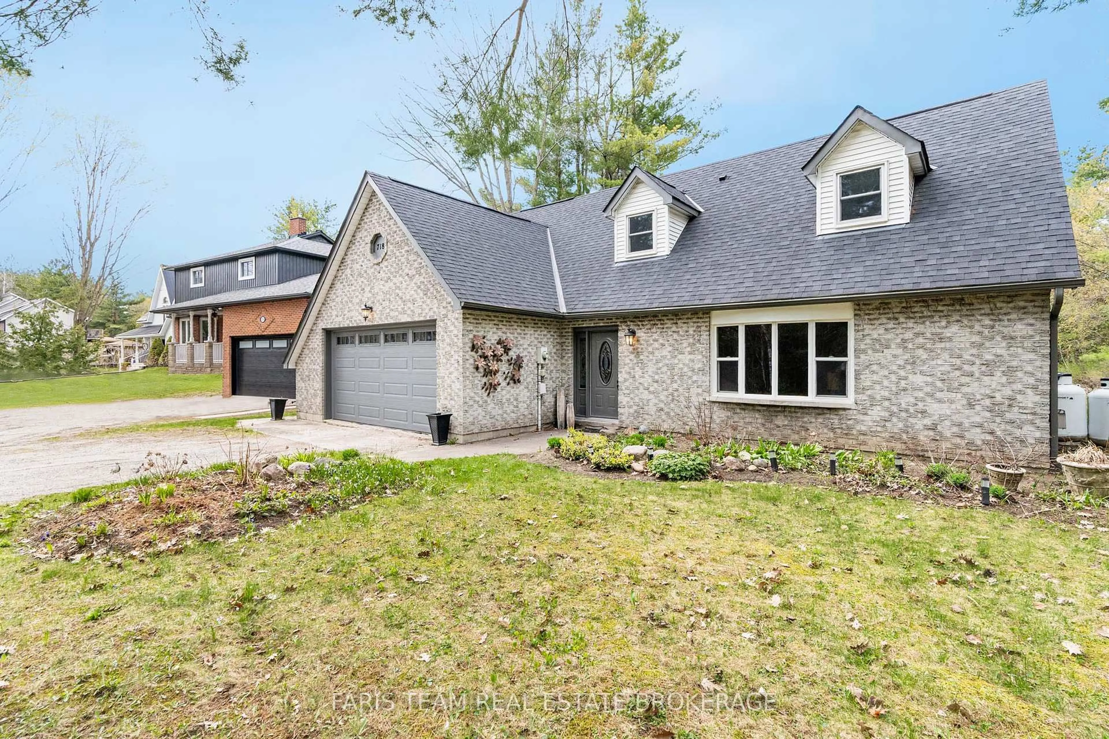 Home with brick exterior material, street for 718 Henderson Dr, Innisfil Ontario L9S 2J8