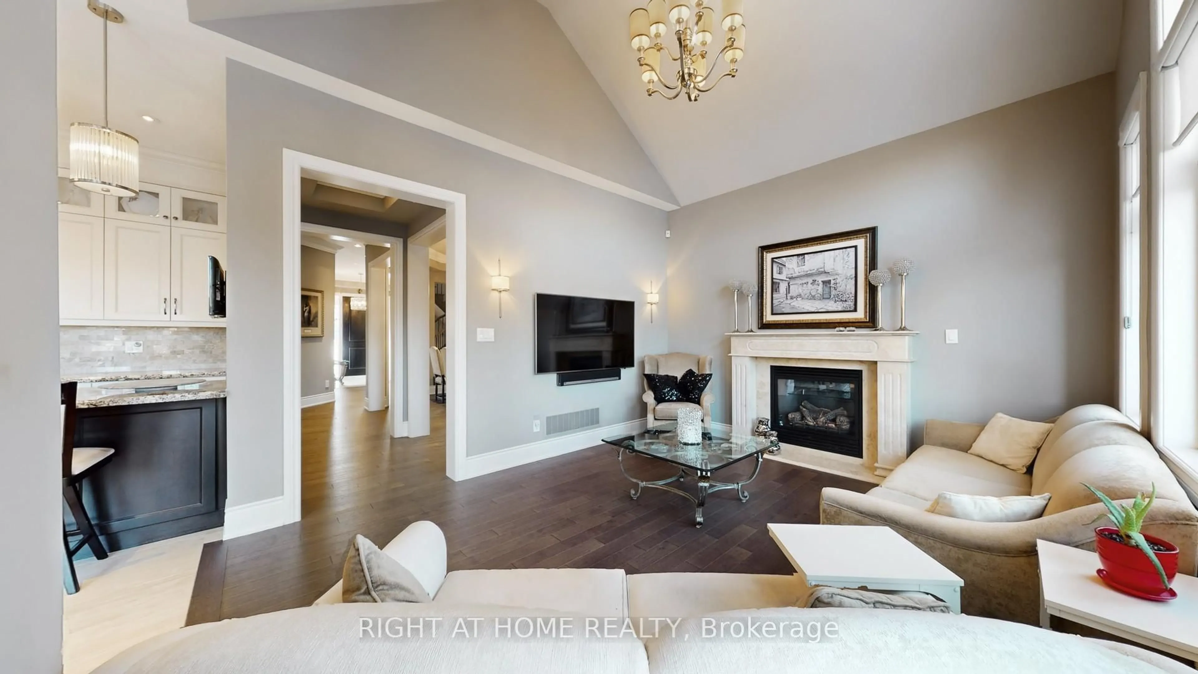 Living room with furniture, wood/laminate floor for 131 Robert Berry Cres, King Ontario L7B 0M3