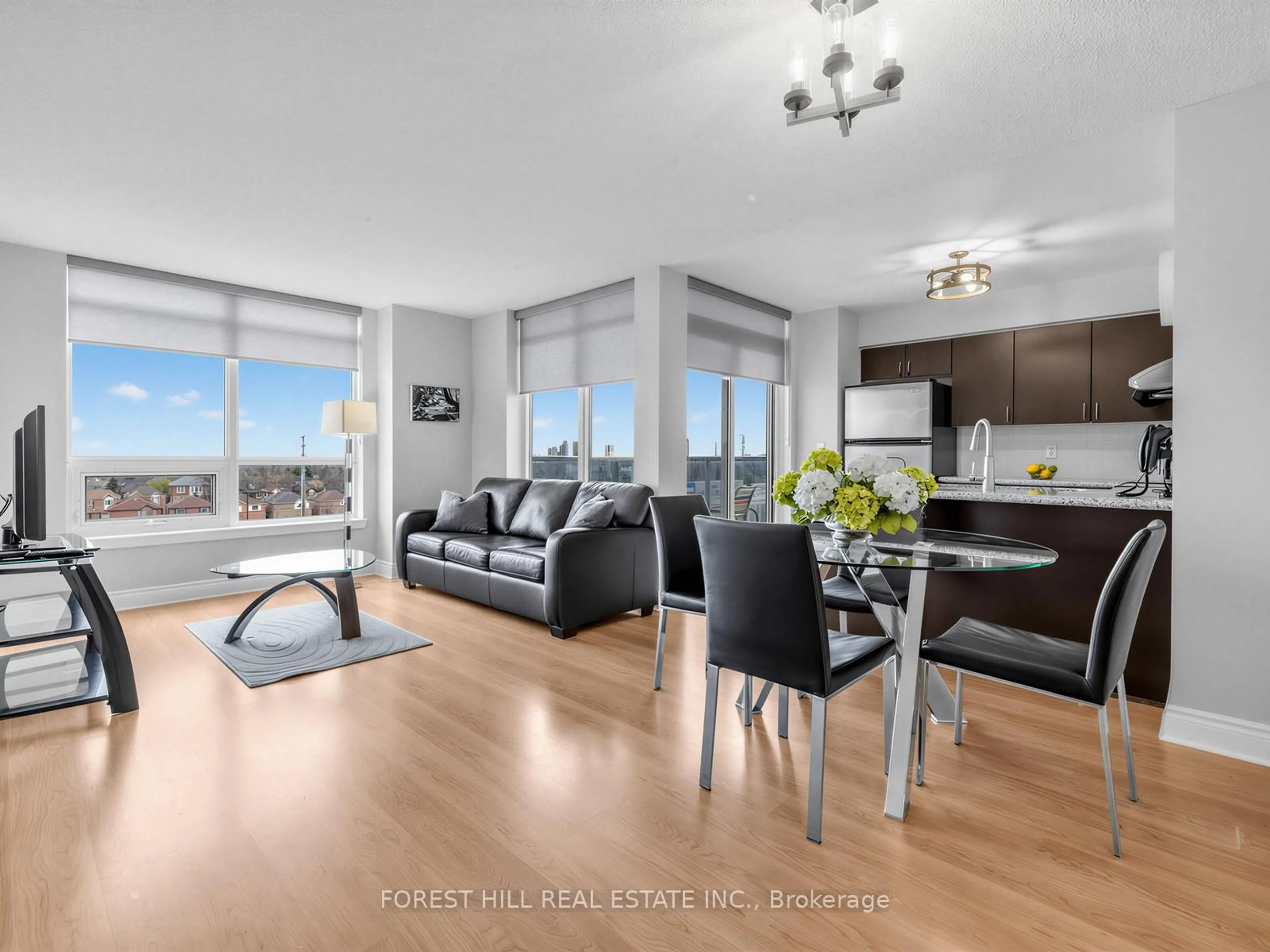 Living room with furniture, wood/laminate floor for 7 North Park Rd #511, Vaughan Ontario L4J 0C9