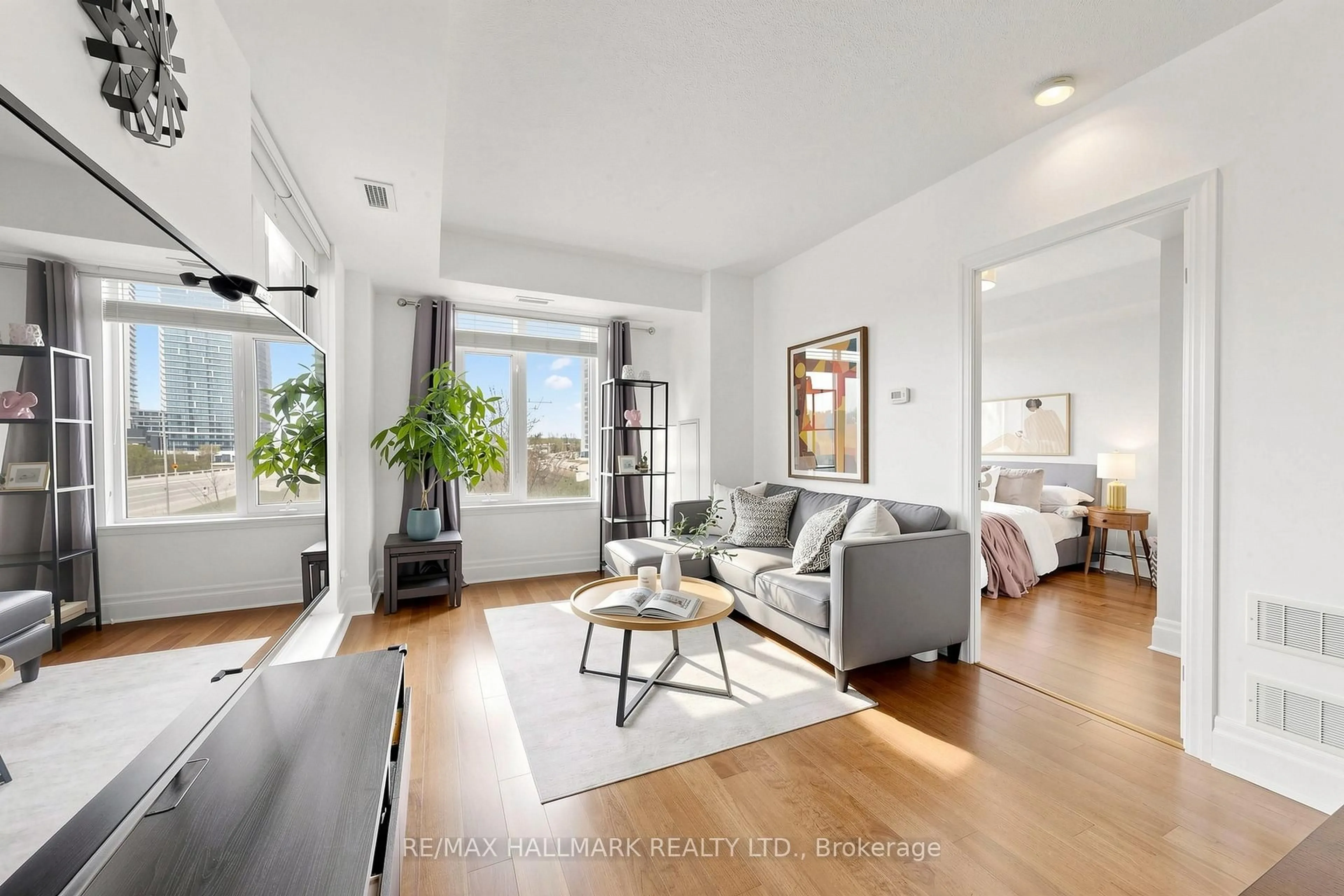 Living room with furniture, unknown for 151 Upper Duke Cres #203, Markham Ontario L6G 0E1